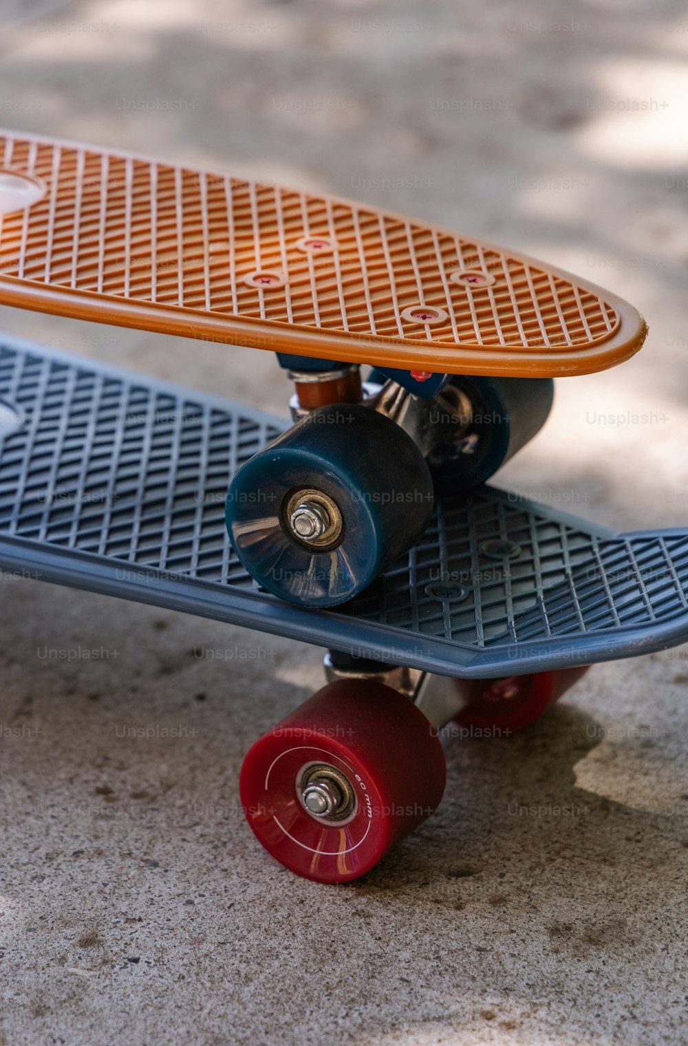 a close up of a skateboard on the ground