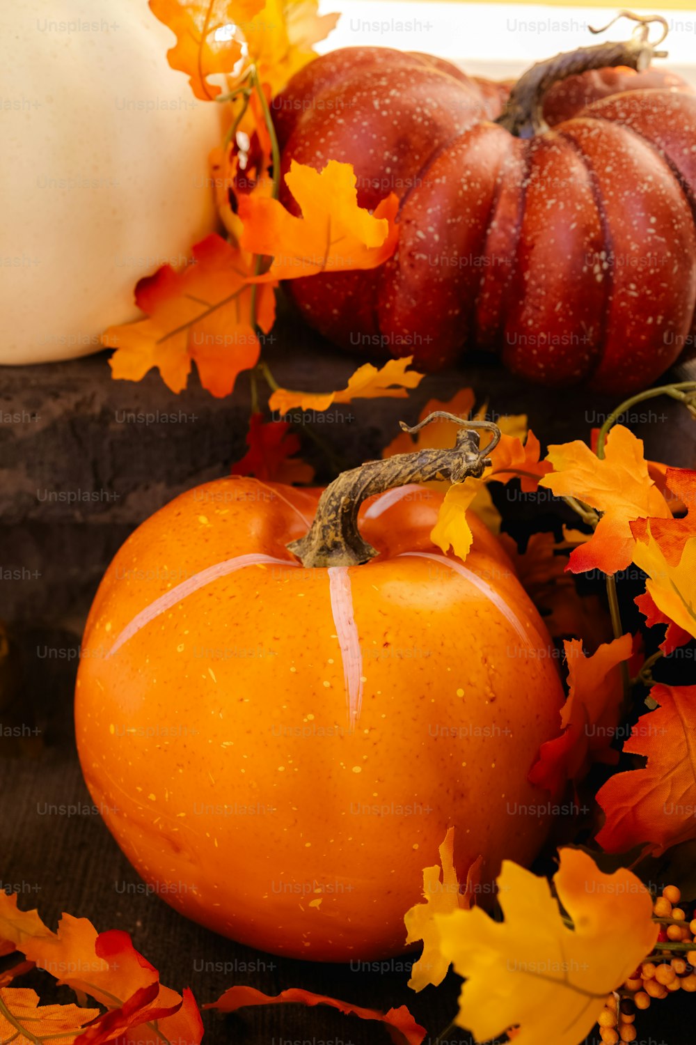 a close up of a pumpkin on a table