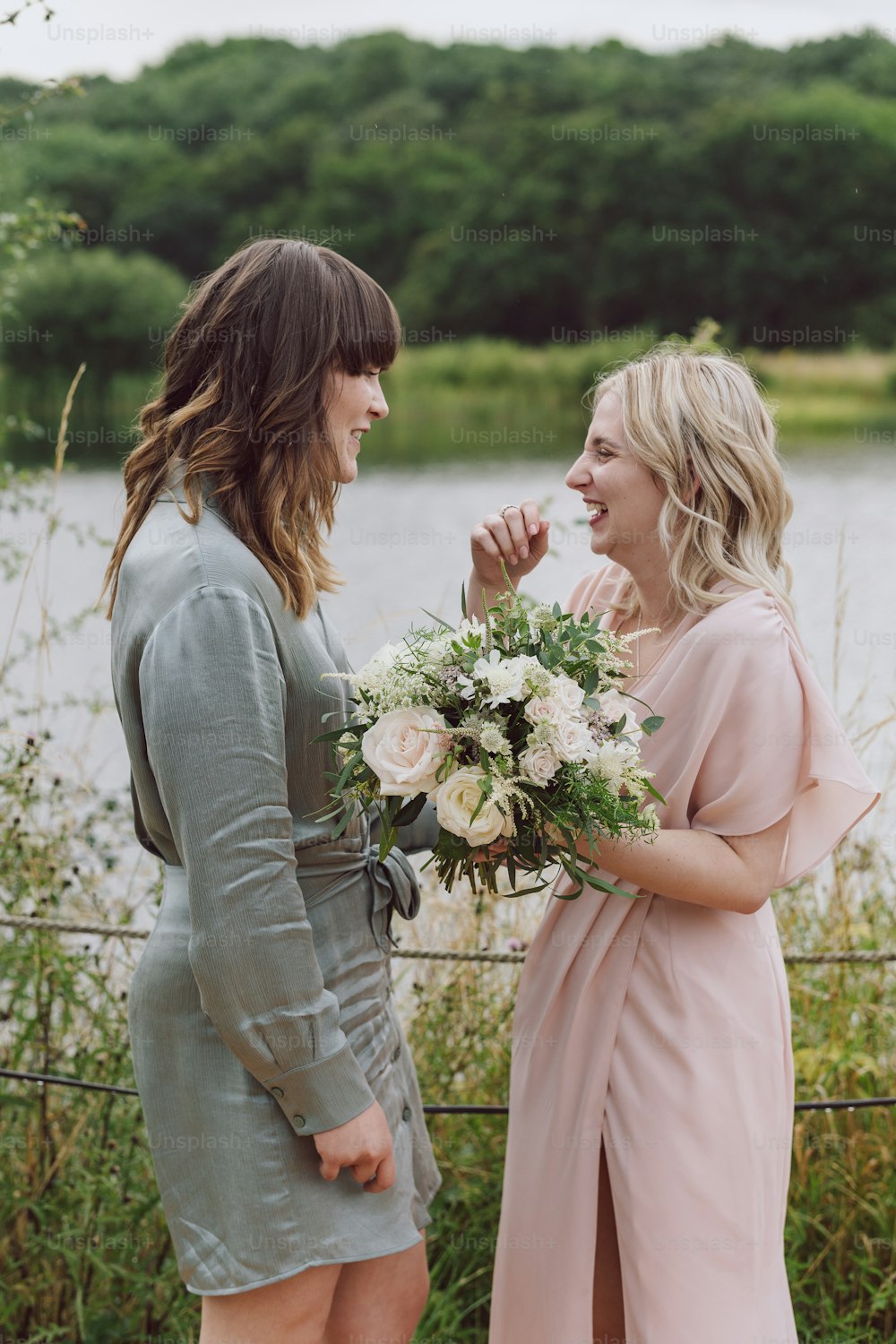 a couple of women standing next to each other