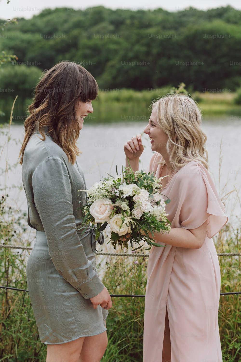 a couple of women standing next to each other