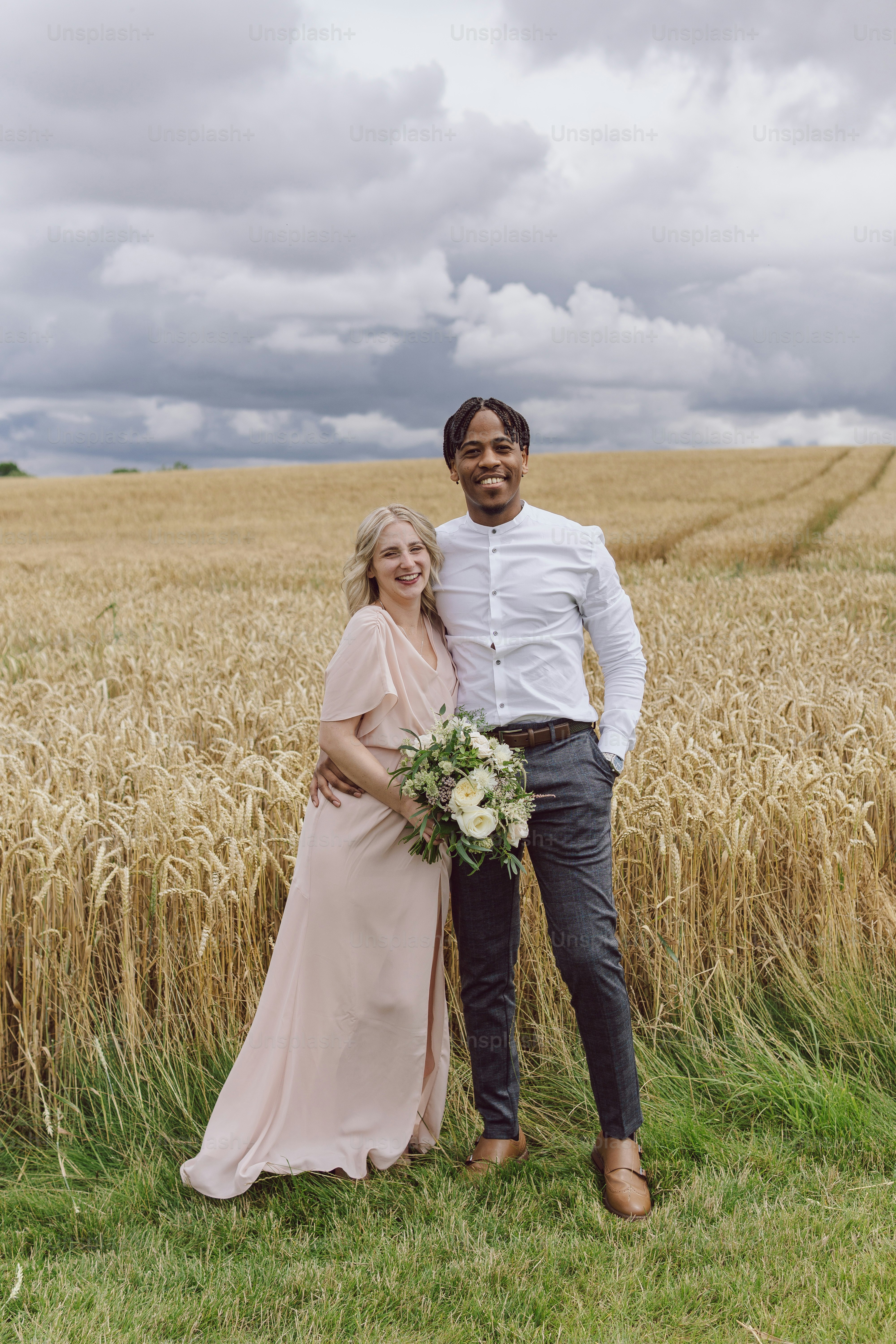 A group of women standing next to each other in a field photo – Flowers ...