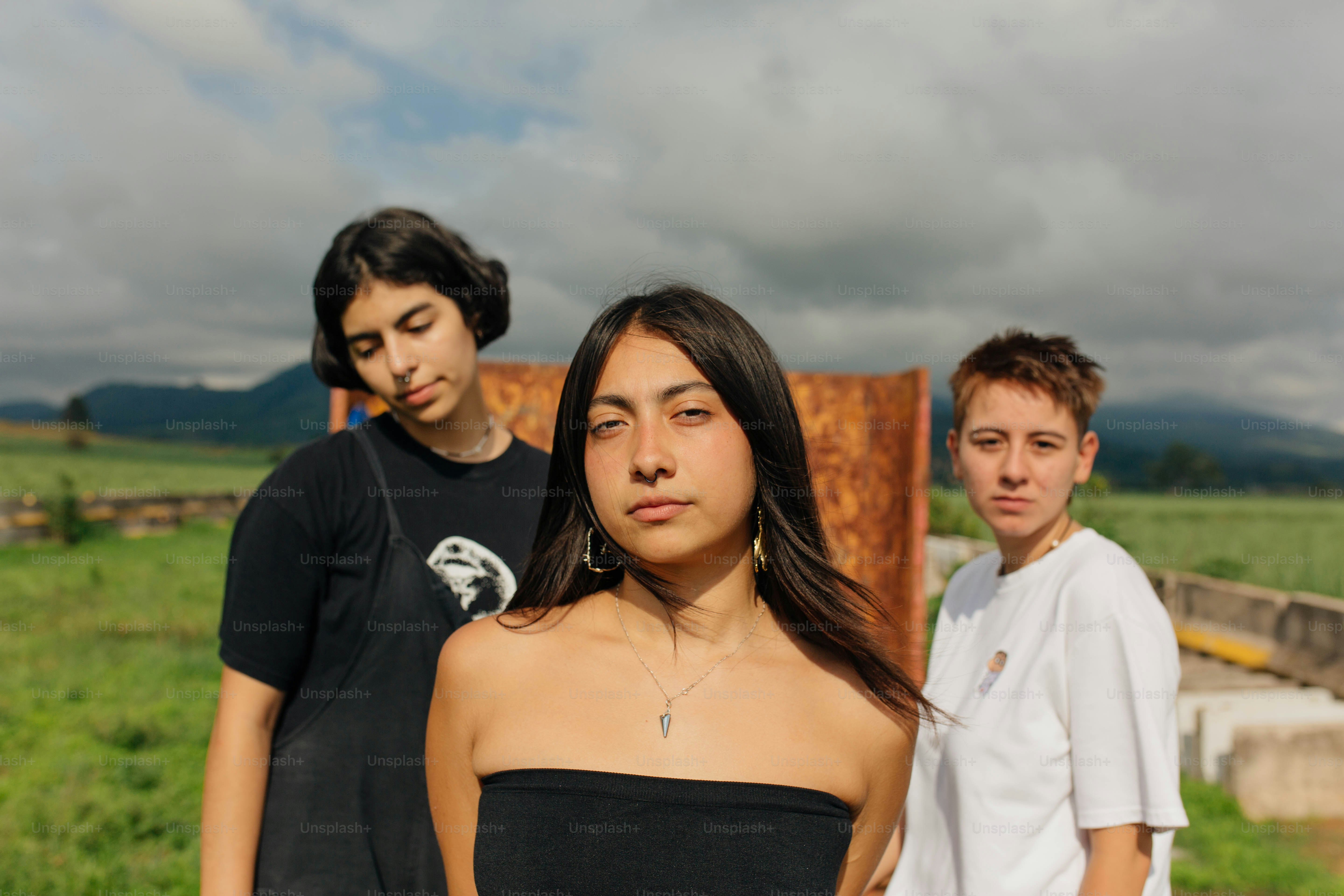 a group of young people standing next to each other
