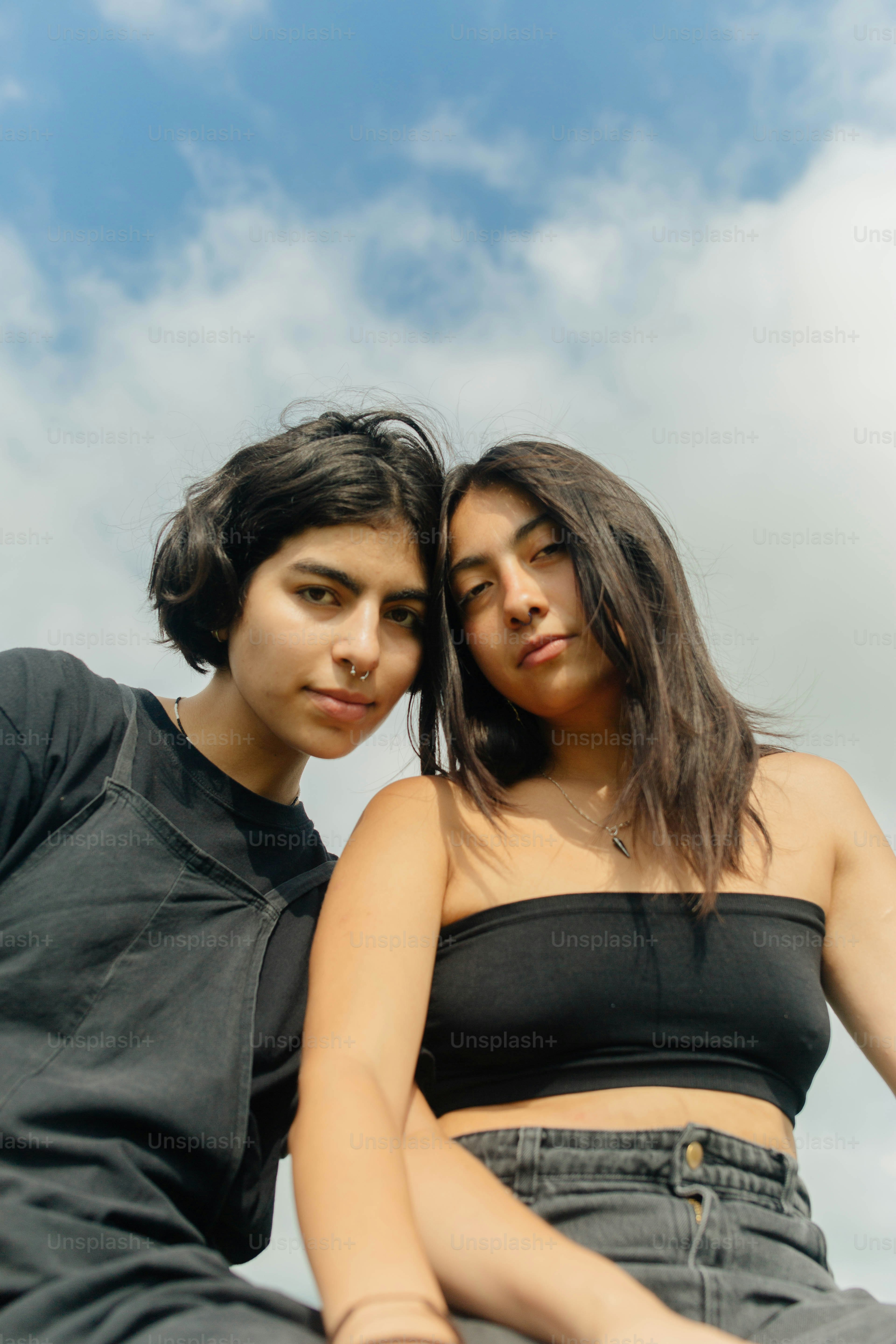 a man and a woman sitting next to each other