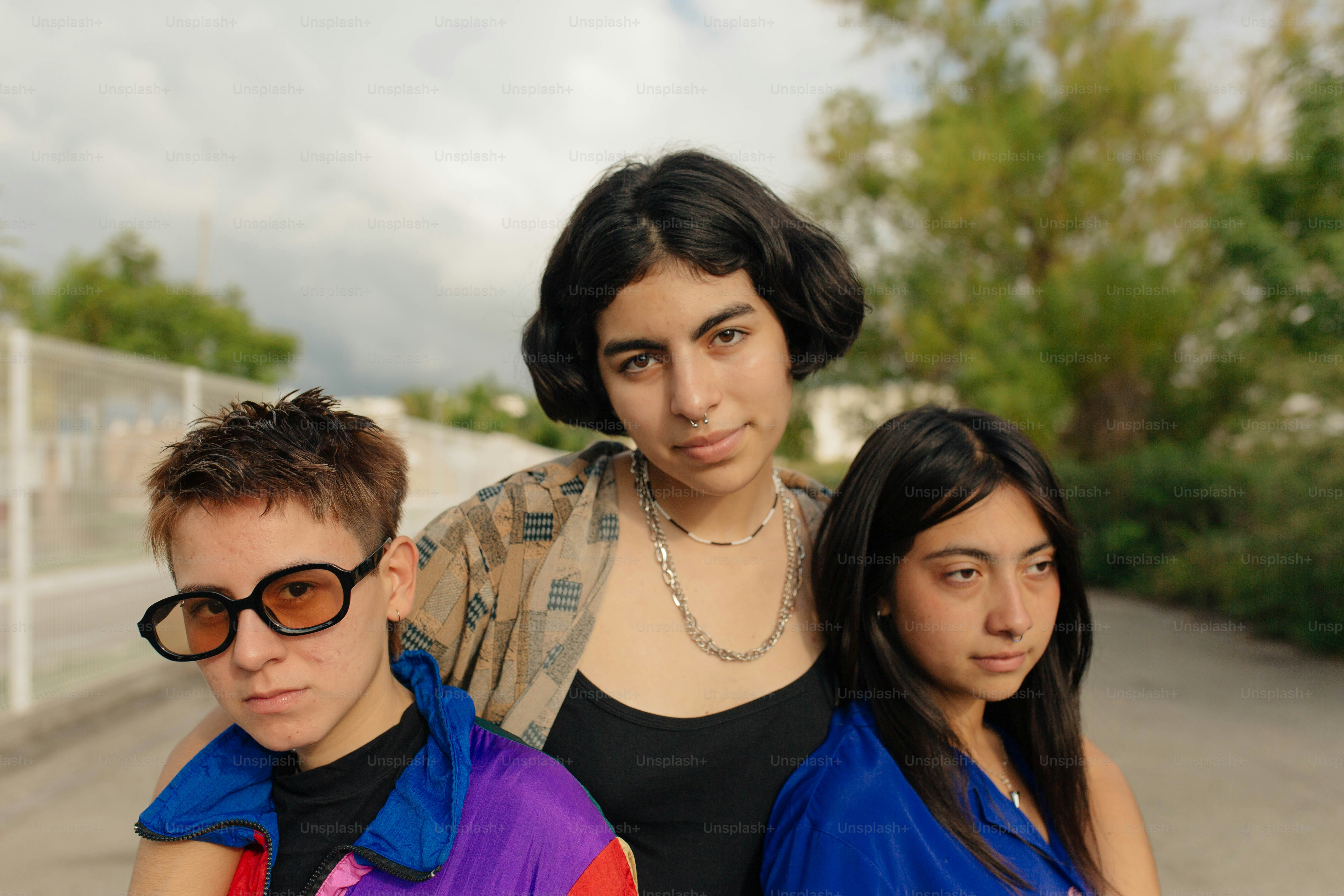 a group of young people standing next to each other