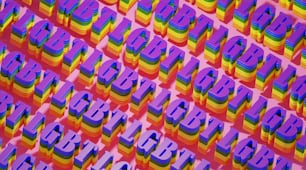 a large number of colorful letters on a pink background