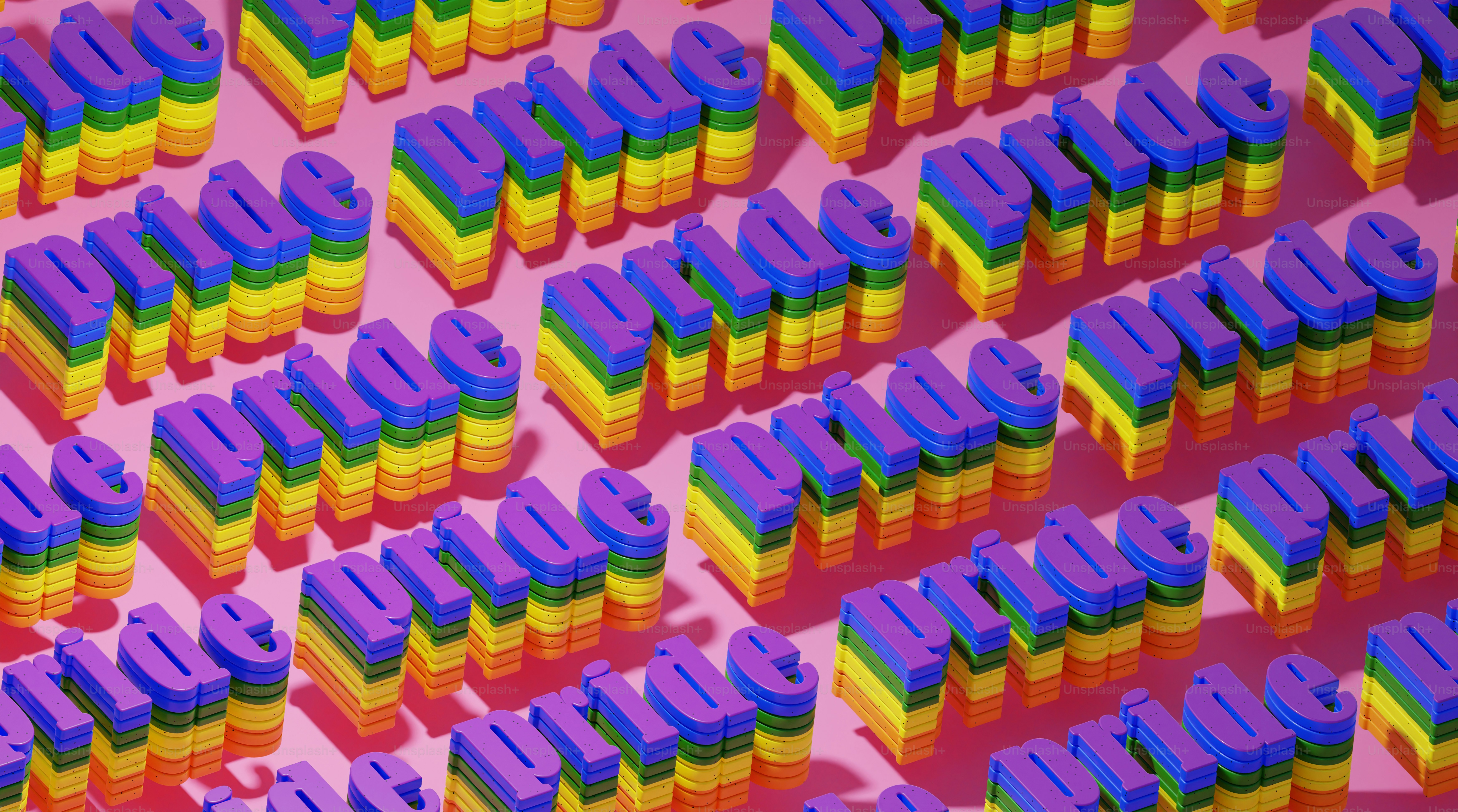 una gran cantidad de letras coloridas sobre un fondo rosa