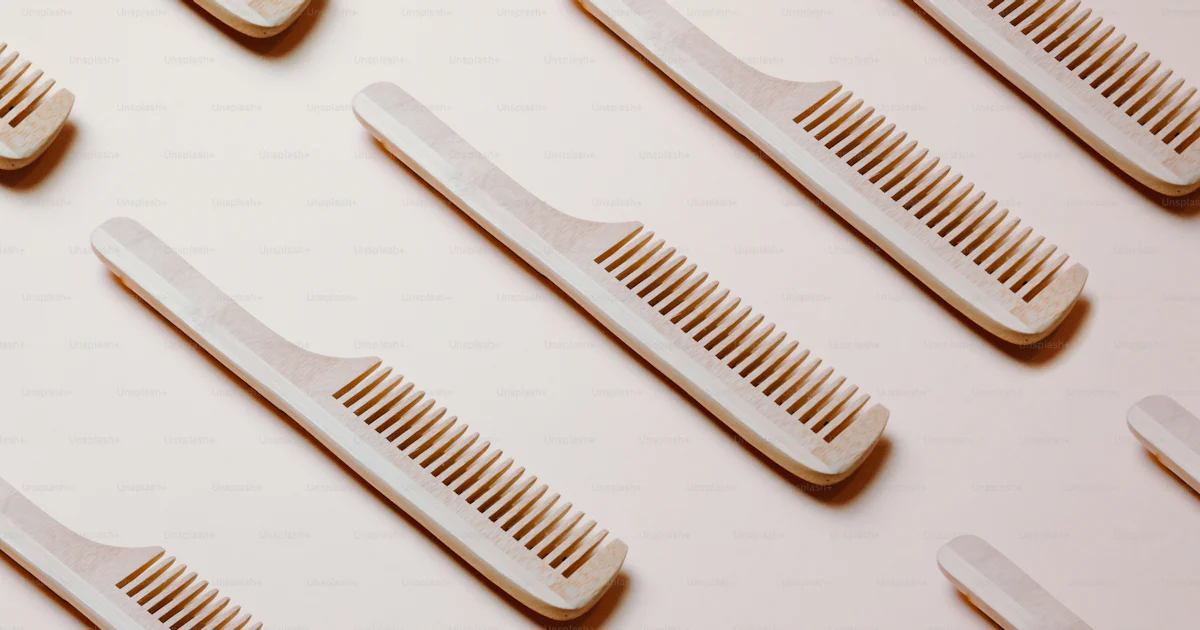 A group of combs sitting on top of each other photo – Comb Image on ...