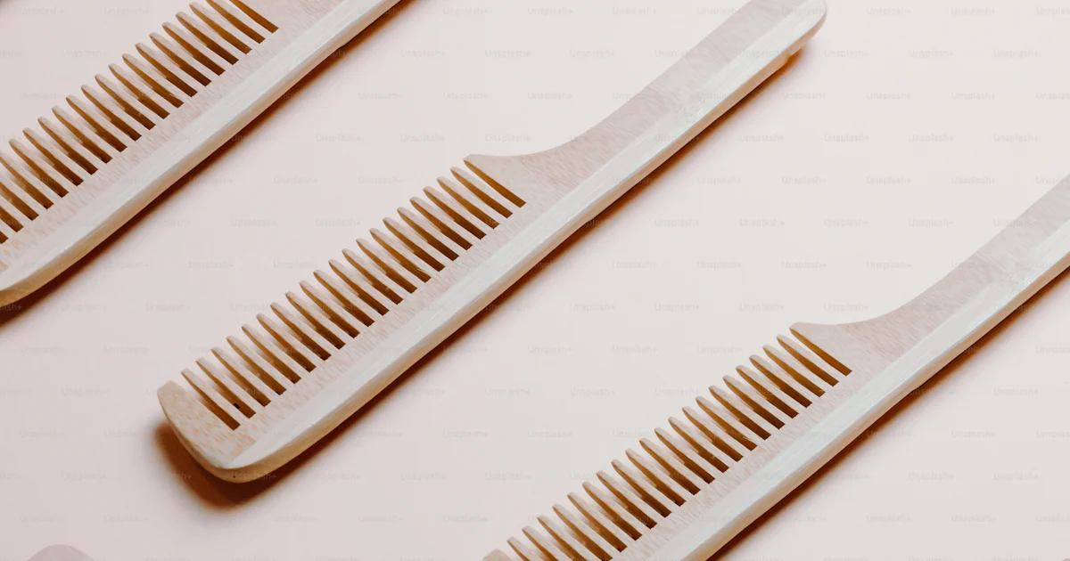 A group of combs sitting on top of each other photo – Comb Image on ...