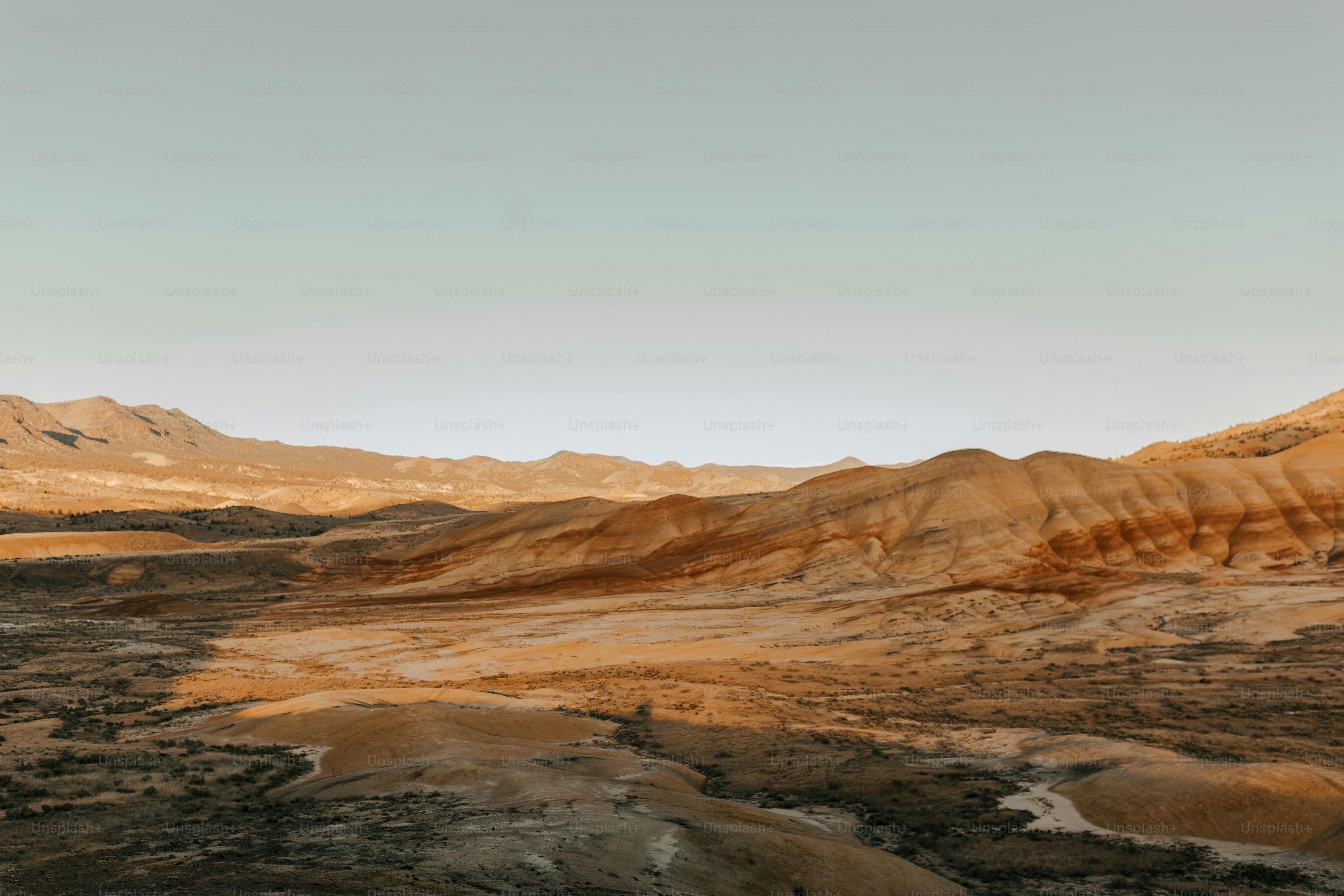 a mountain range with a river running through it