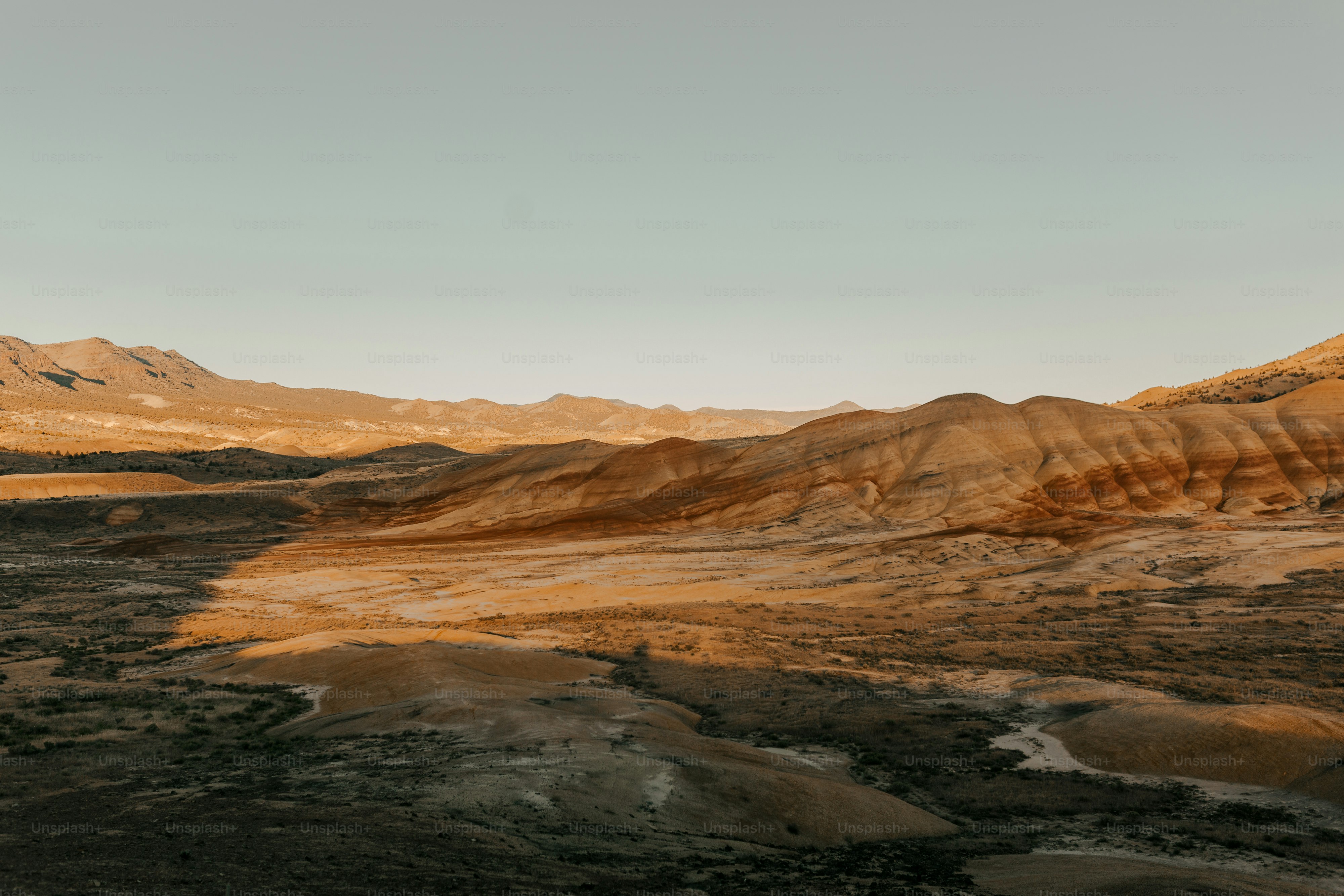 a mountain range with a river running through it
