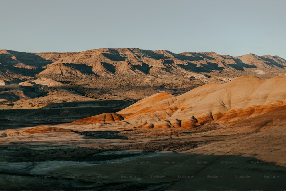 a view of a mountain range in the desert