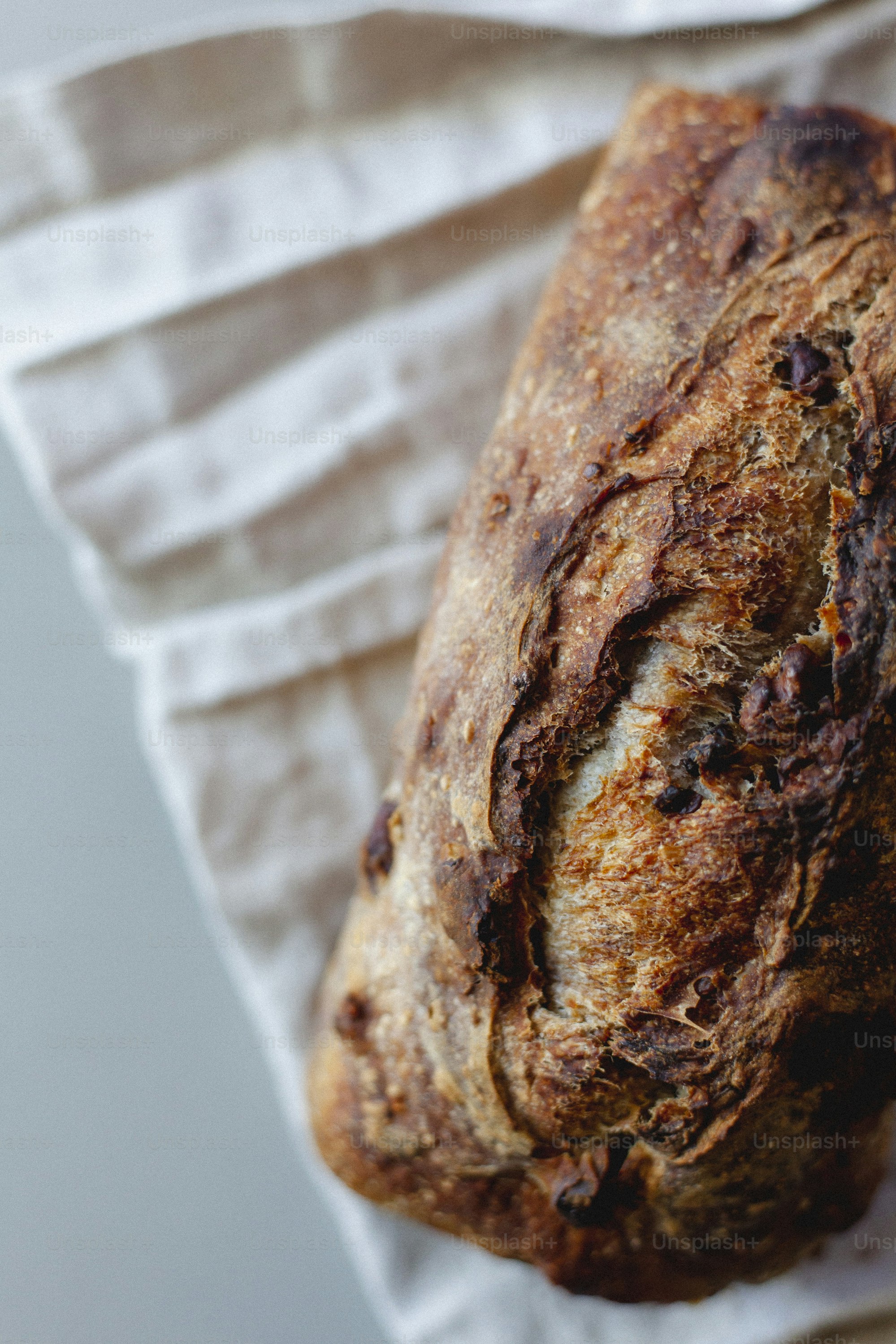 a loaf of bread sitting on top of a piece of paper