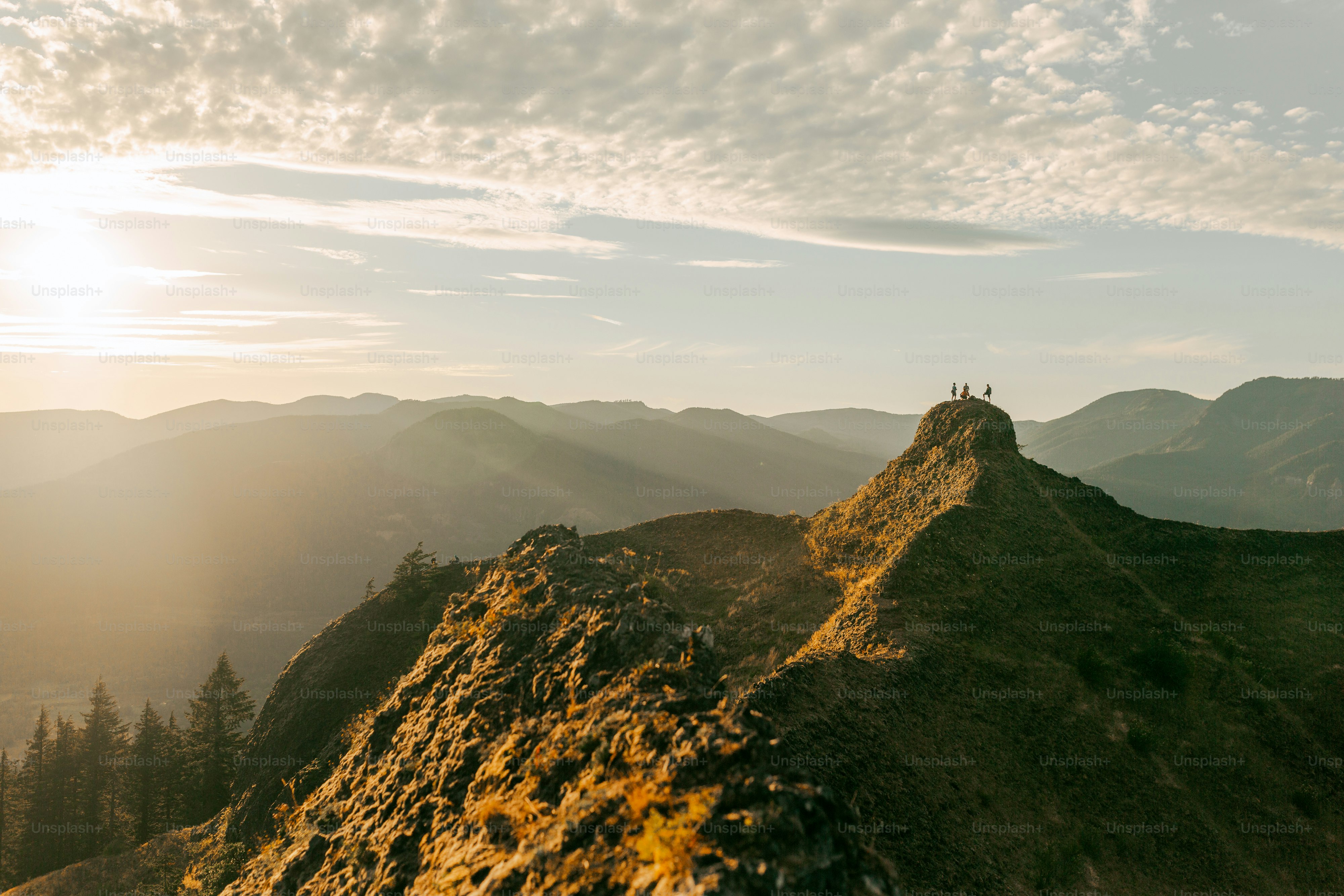 a person standing on top of a mountain