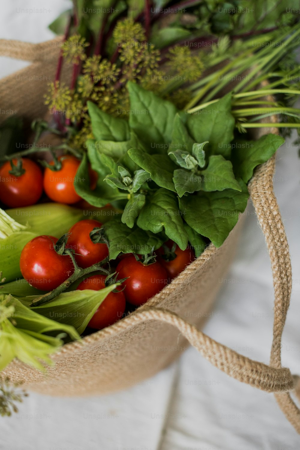 a bag filled with lots of different types of vegetables