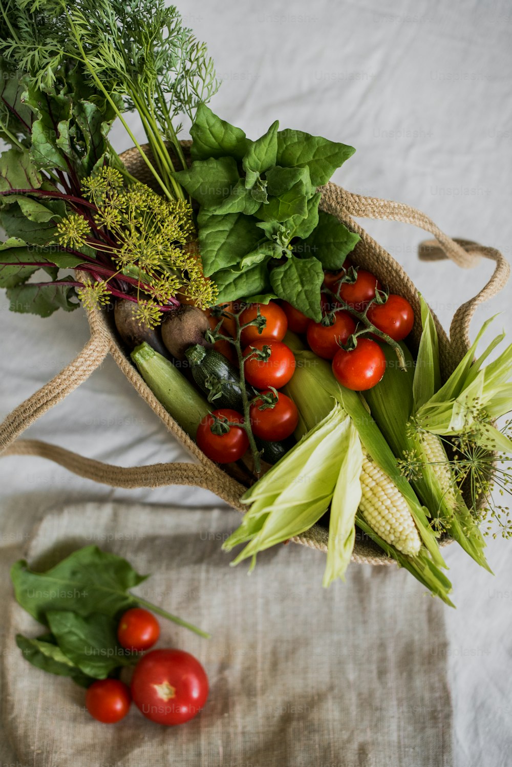 a bag filled with lots of different types of vegetables