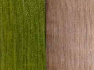 a close up of two different colors of wood