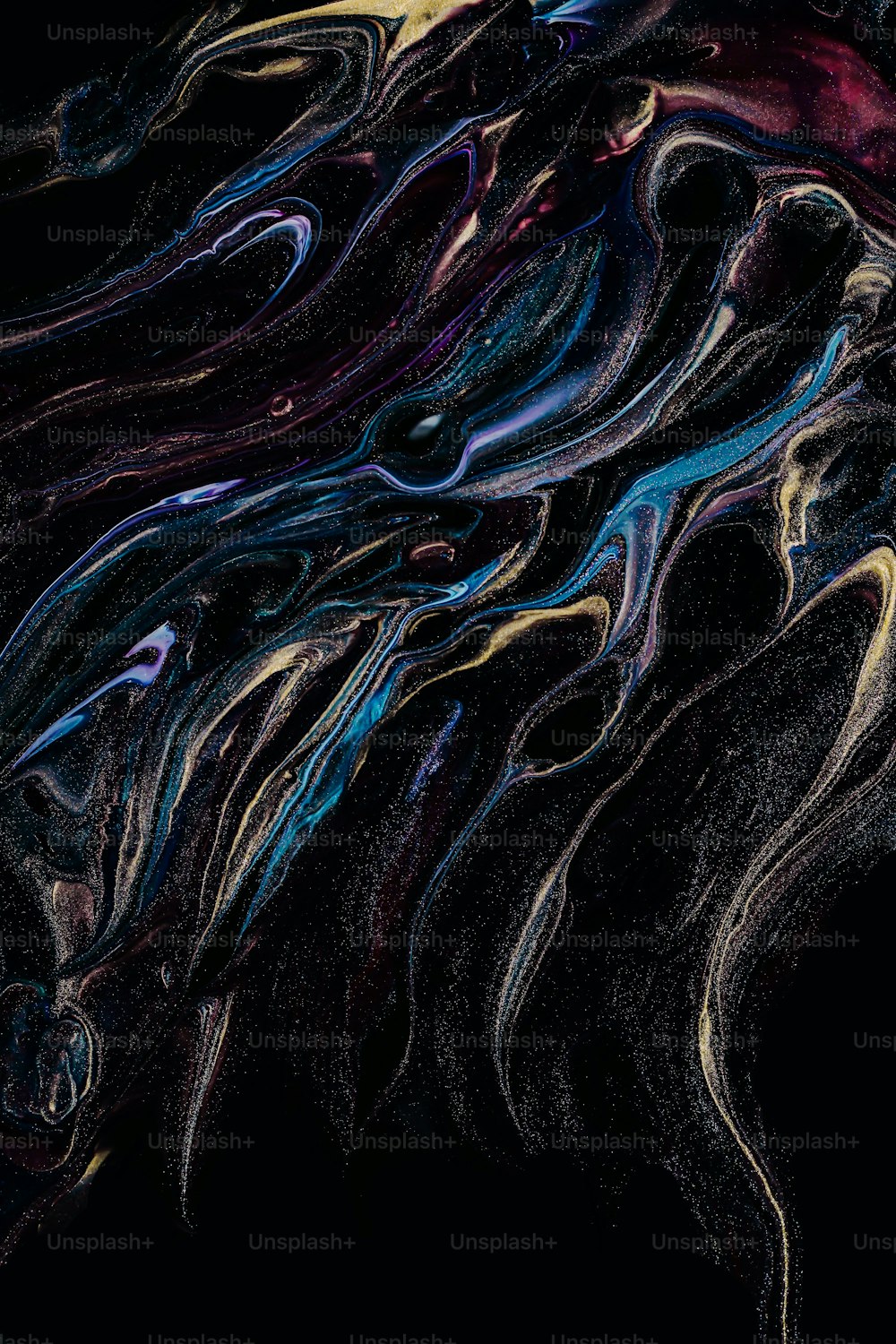 a black background with a multicolored swirl
