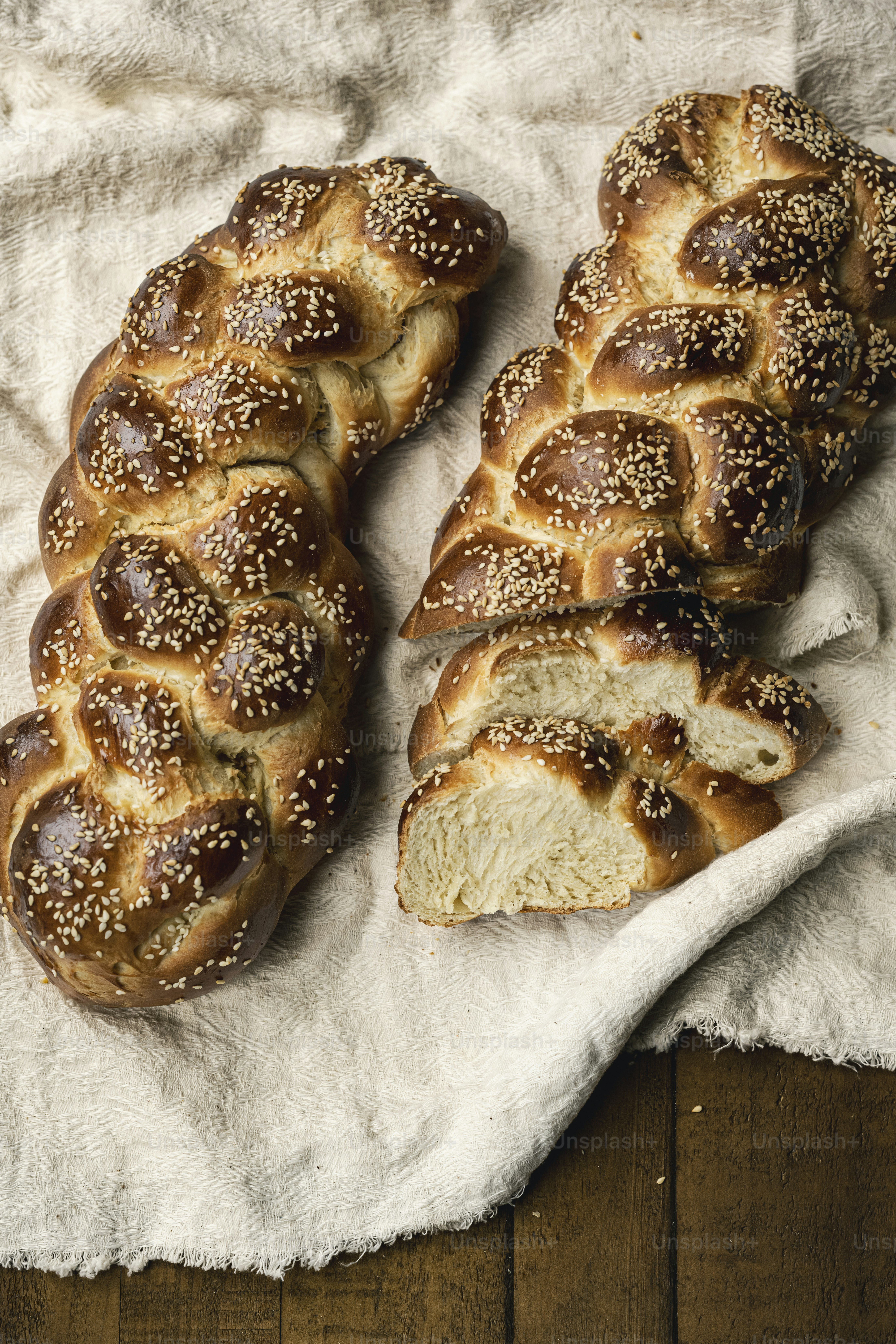 a loaf of bread sitting on top of a white towel
