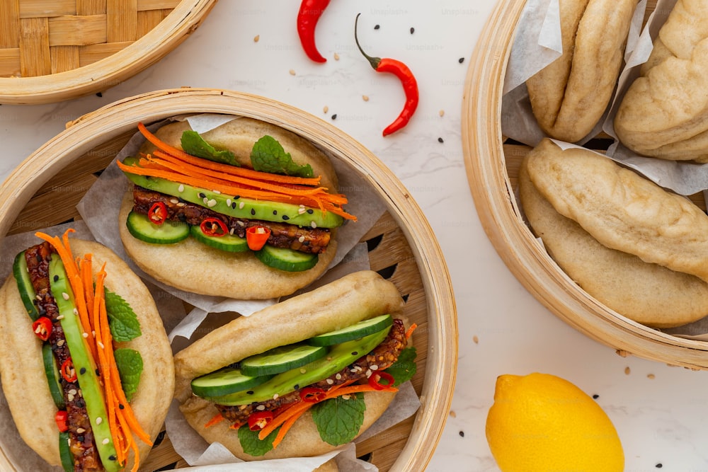 a couple of baskets filled with food on top of a table