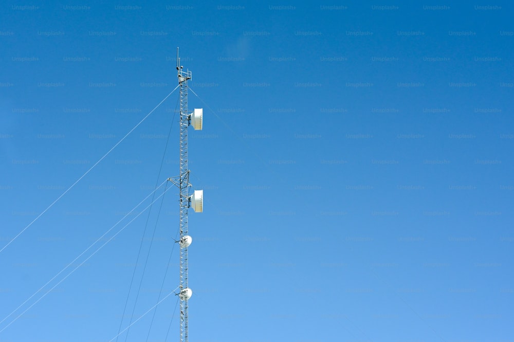 a tall tower with a bunch of lights on top of it