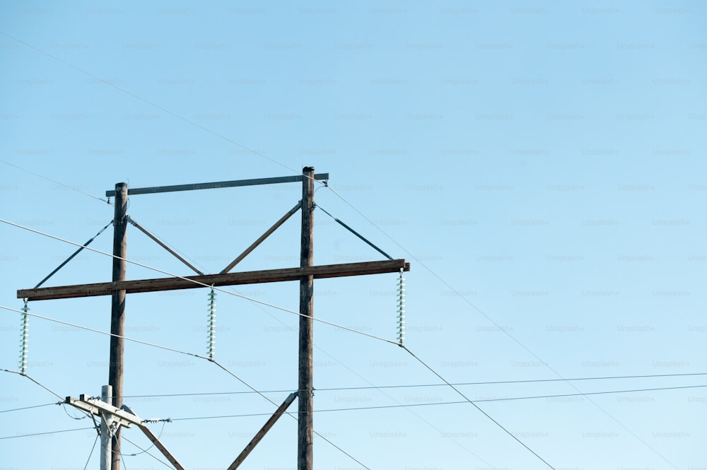 a power pole with a sky in the background