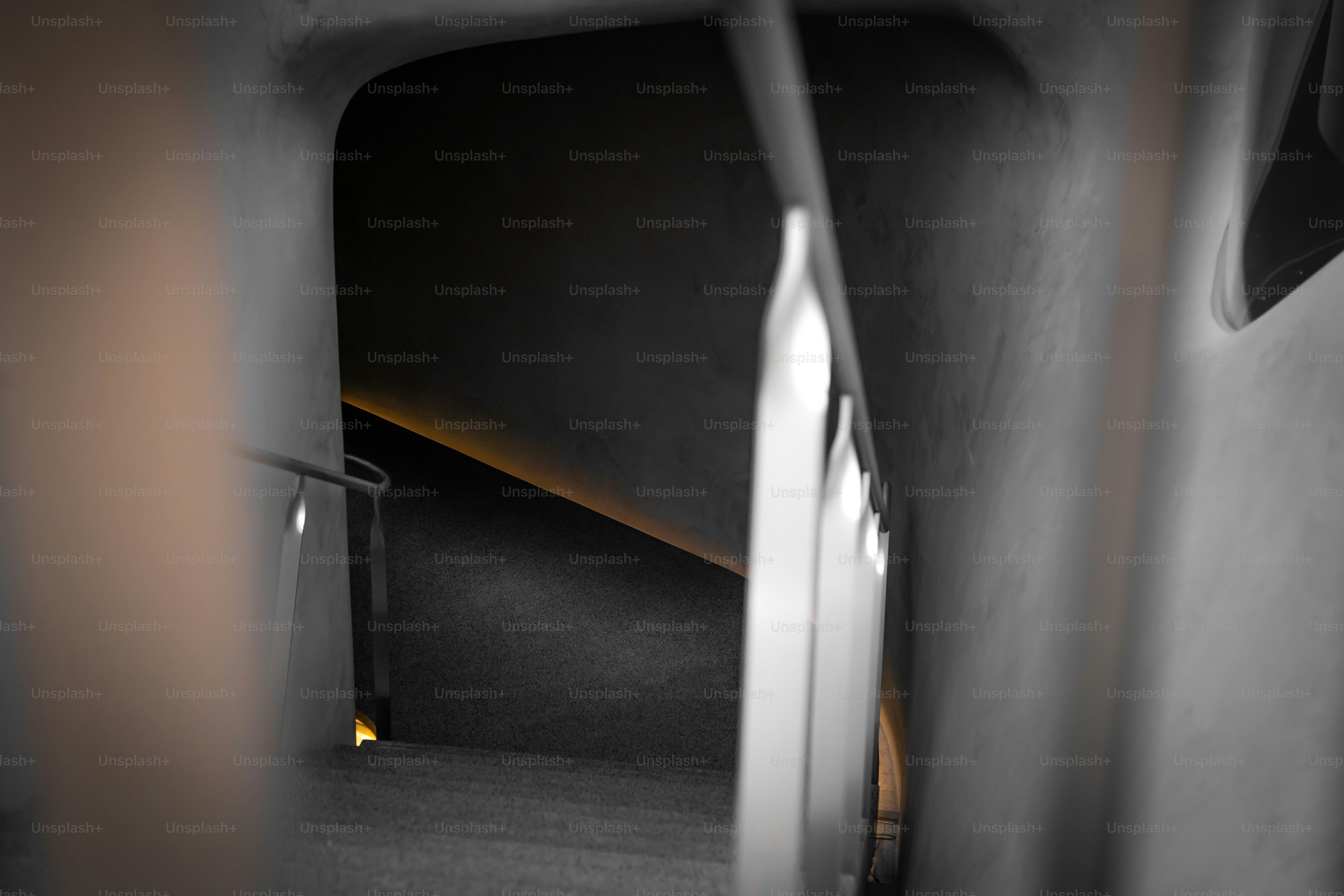 a black and white photo of a stairwell