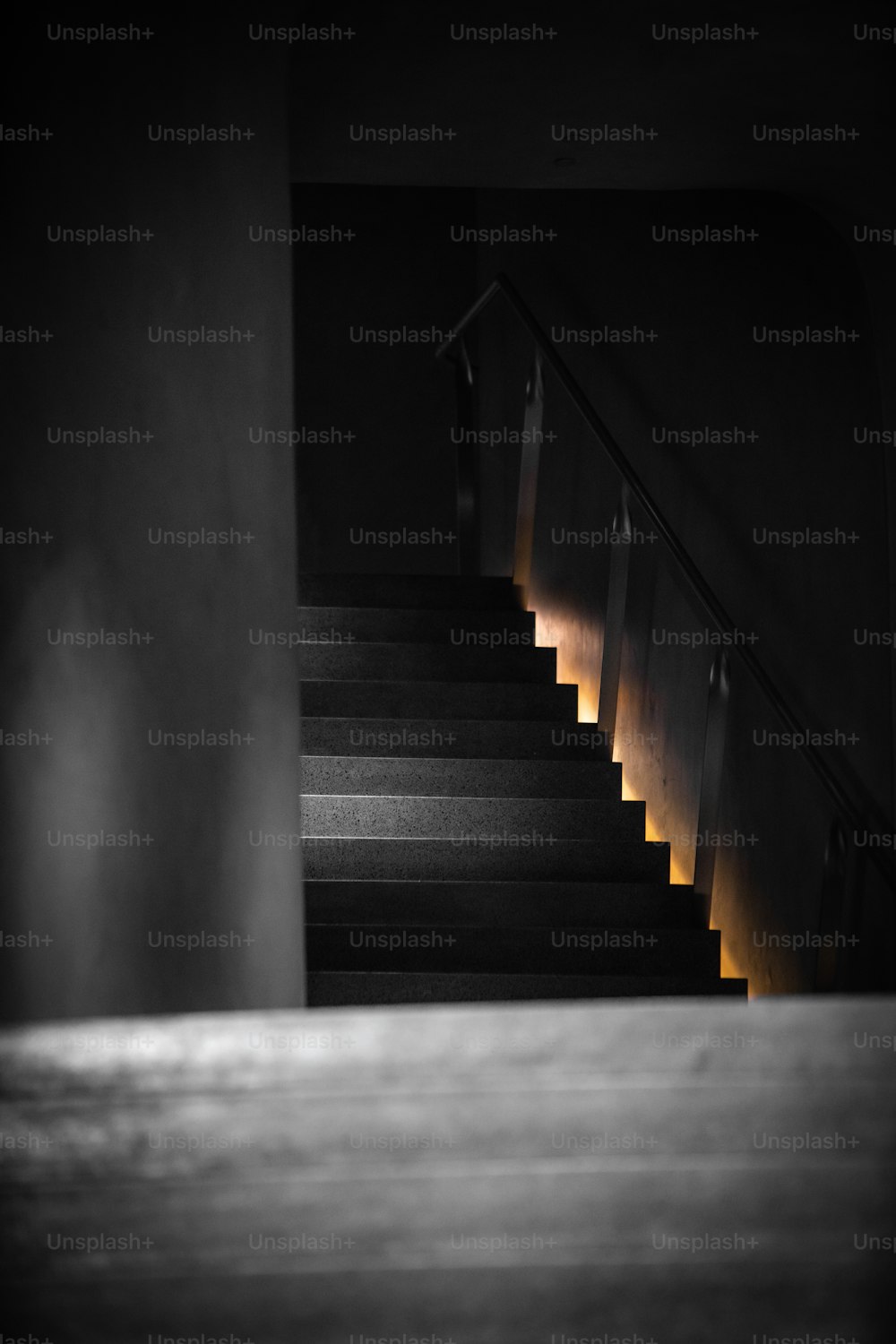 a stair case with a light coming through it