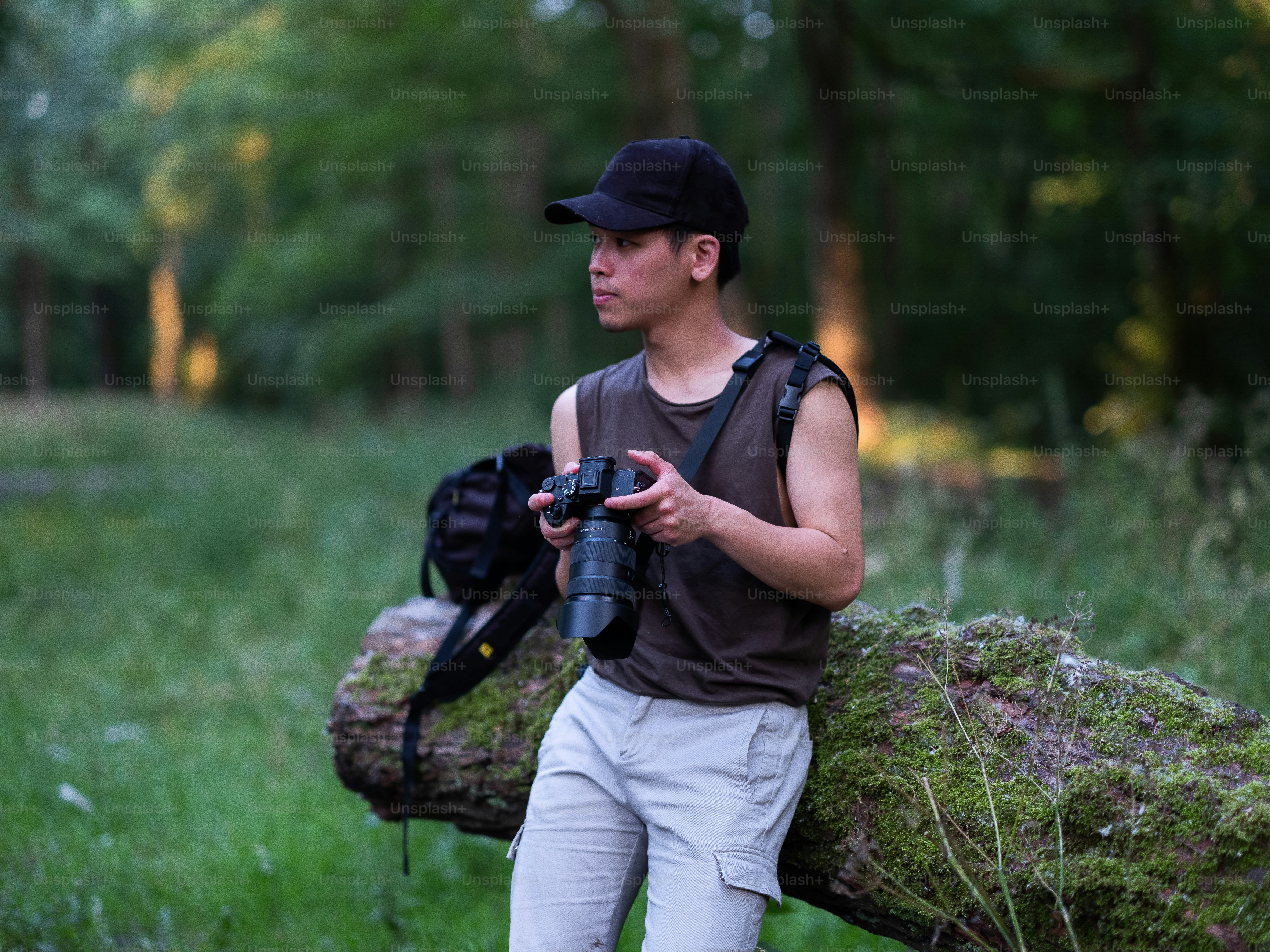 a man with a camera and a backpack