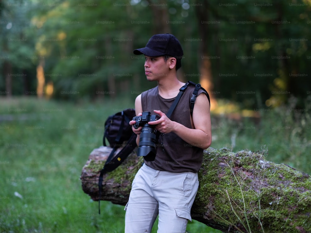 a man with a camera and a backpack