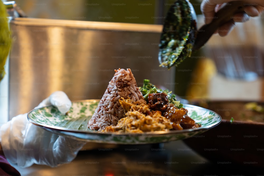 a plate of food is being served on a table