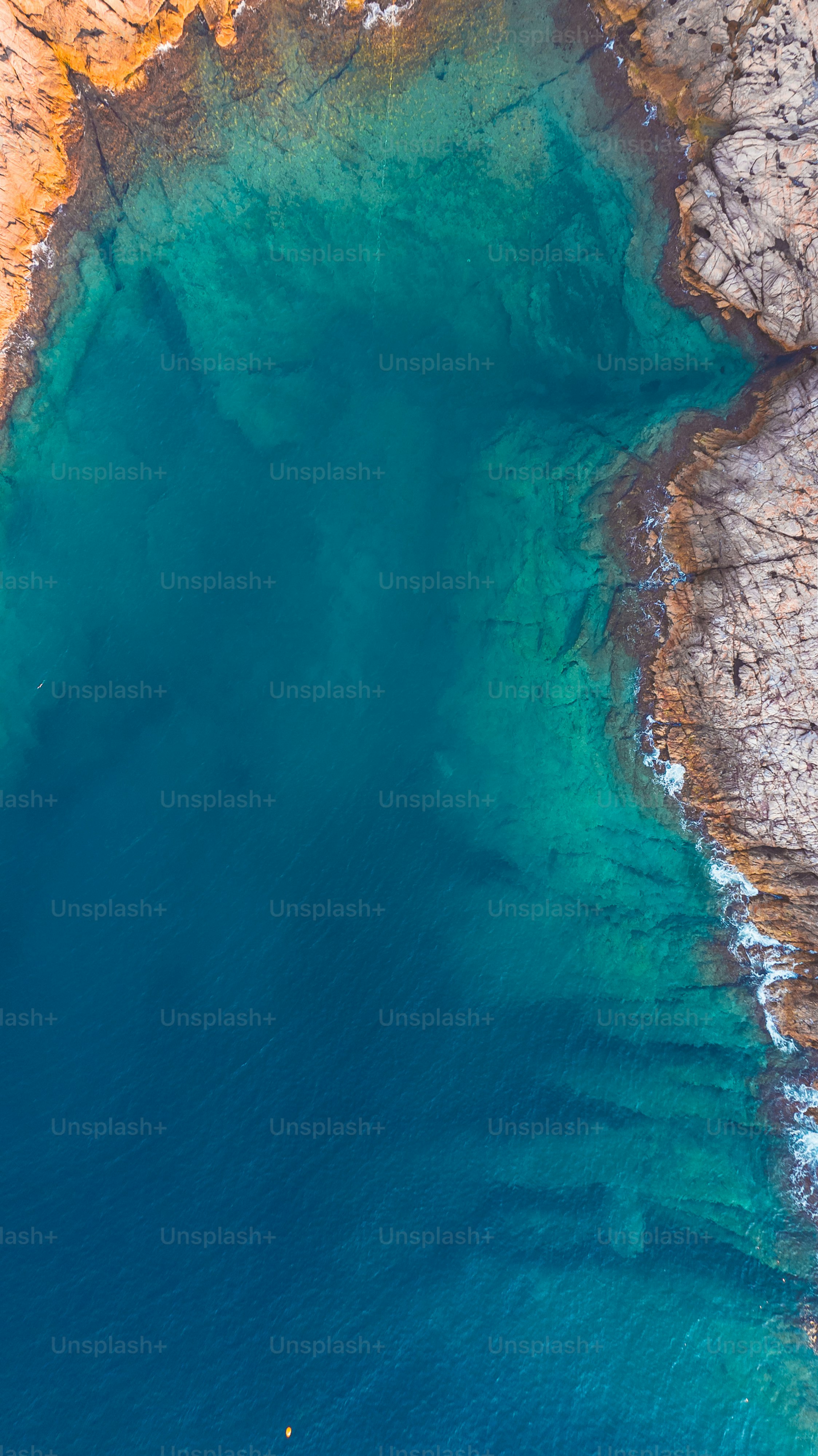 An aerial view of a body of water photo – Sea Image on Unsplash