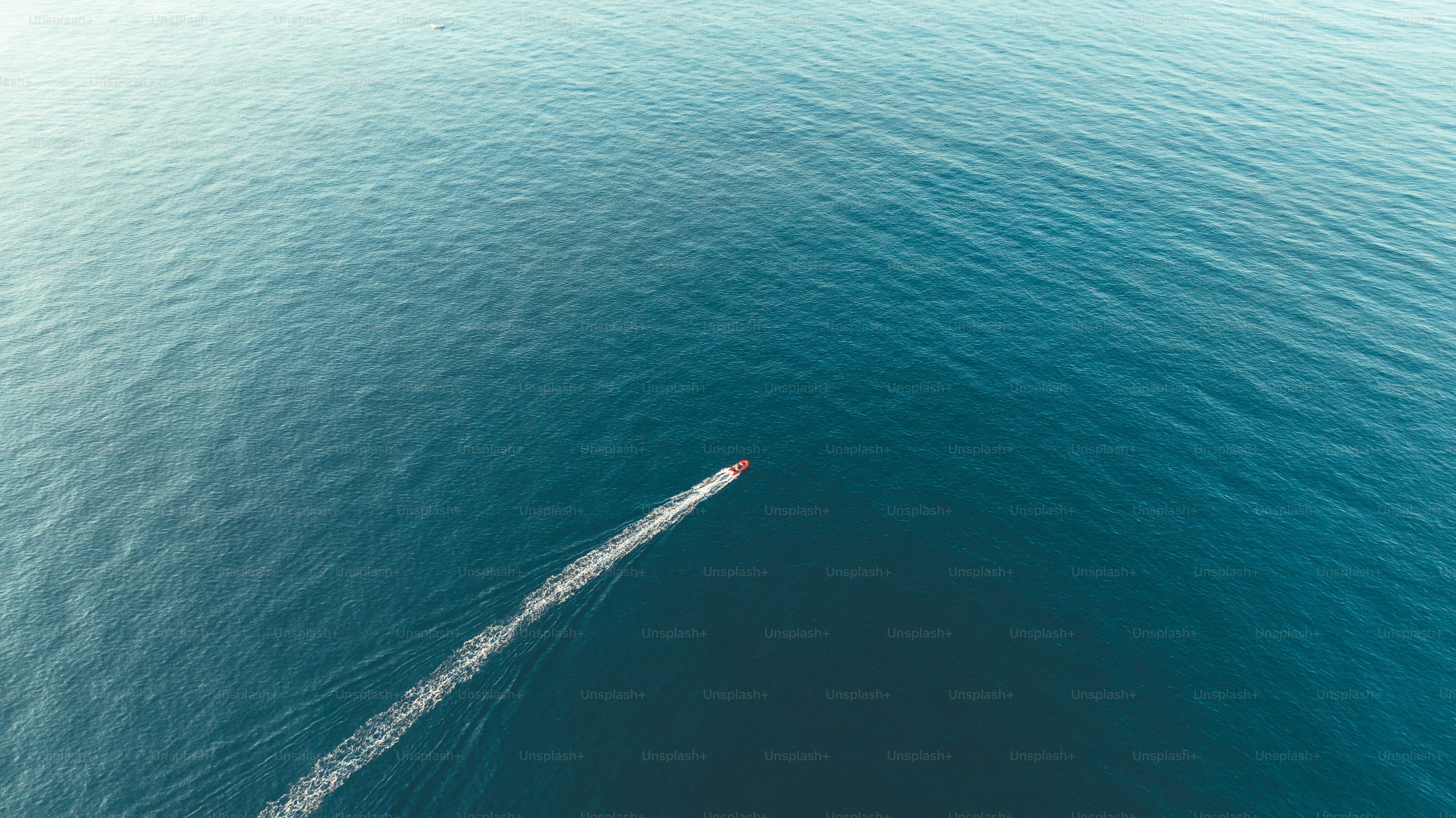 a boat in the middle of a body of water