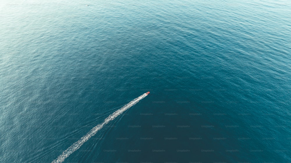 a boat in the middle of a body of water