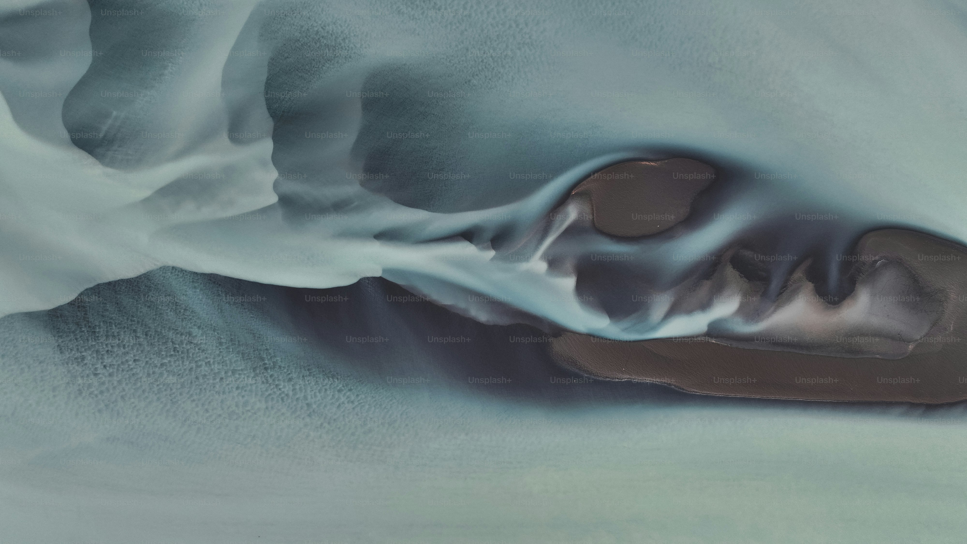 a close up of a person's face in a blanket