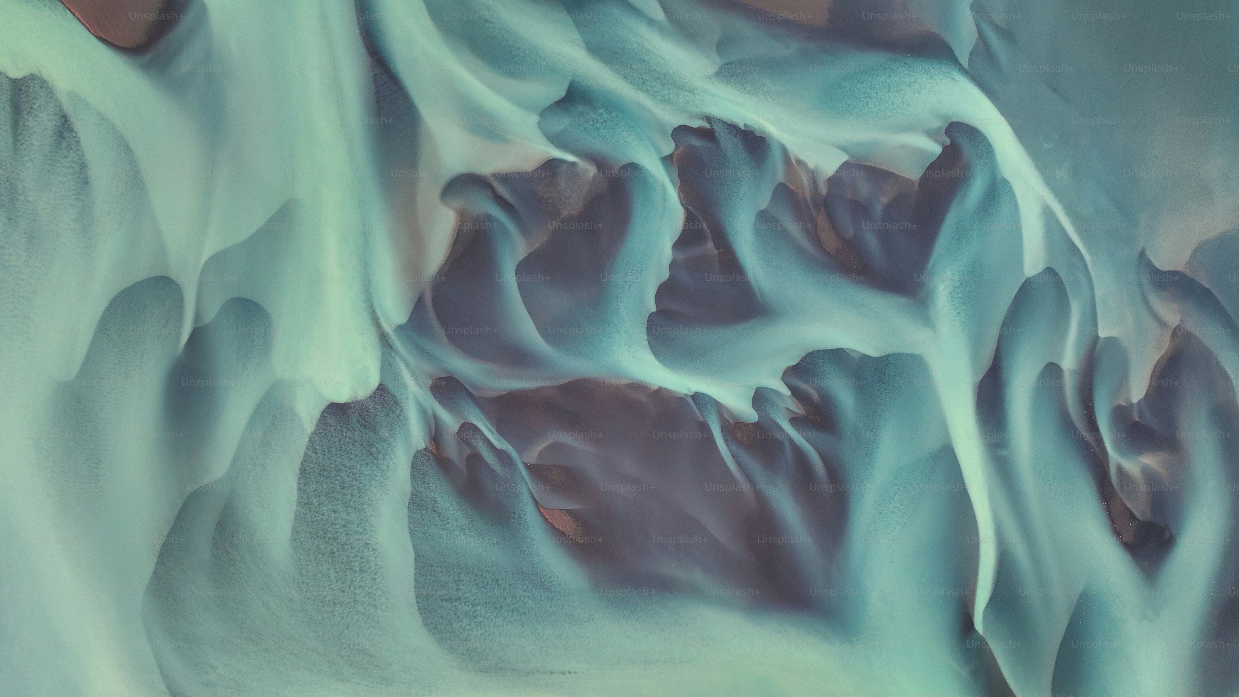 a close up view of a blue and white substance