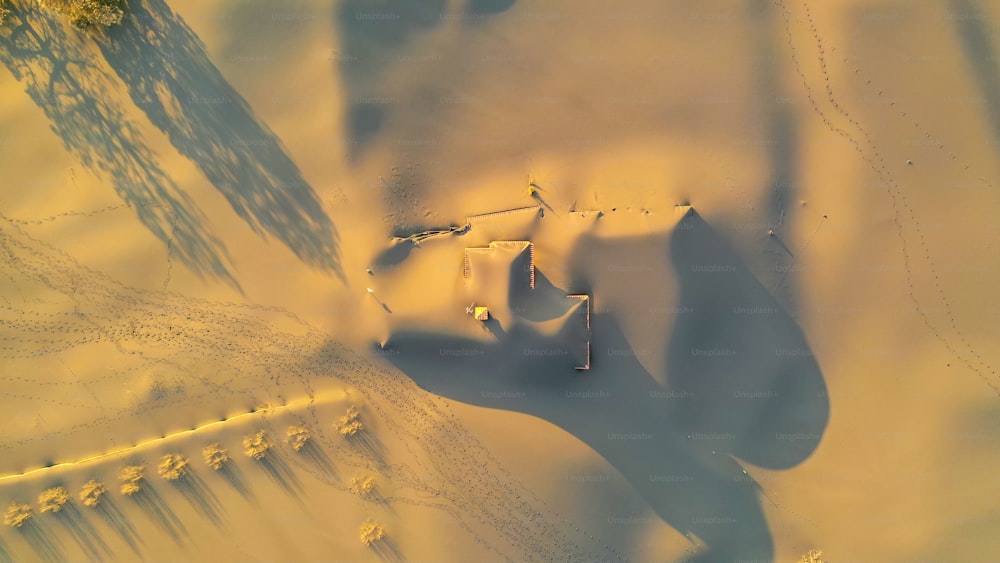 an aerial view of a snow covered field