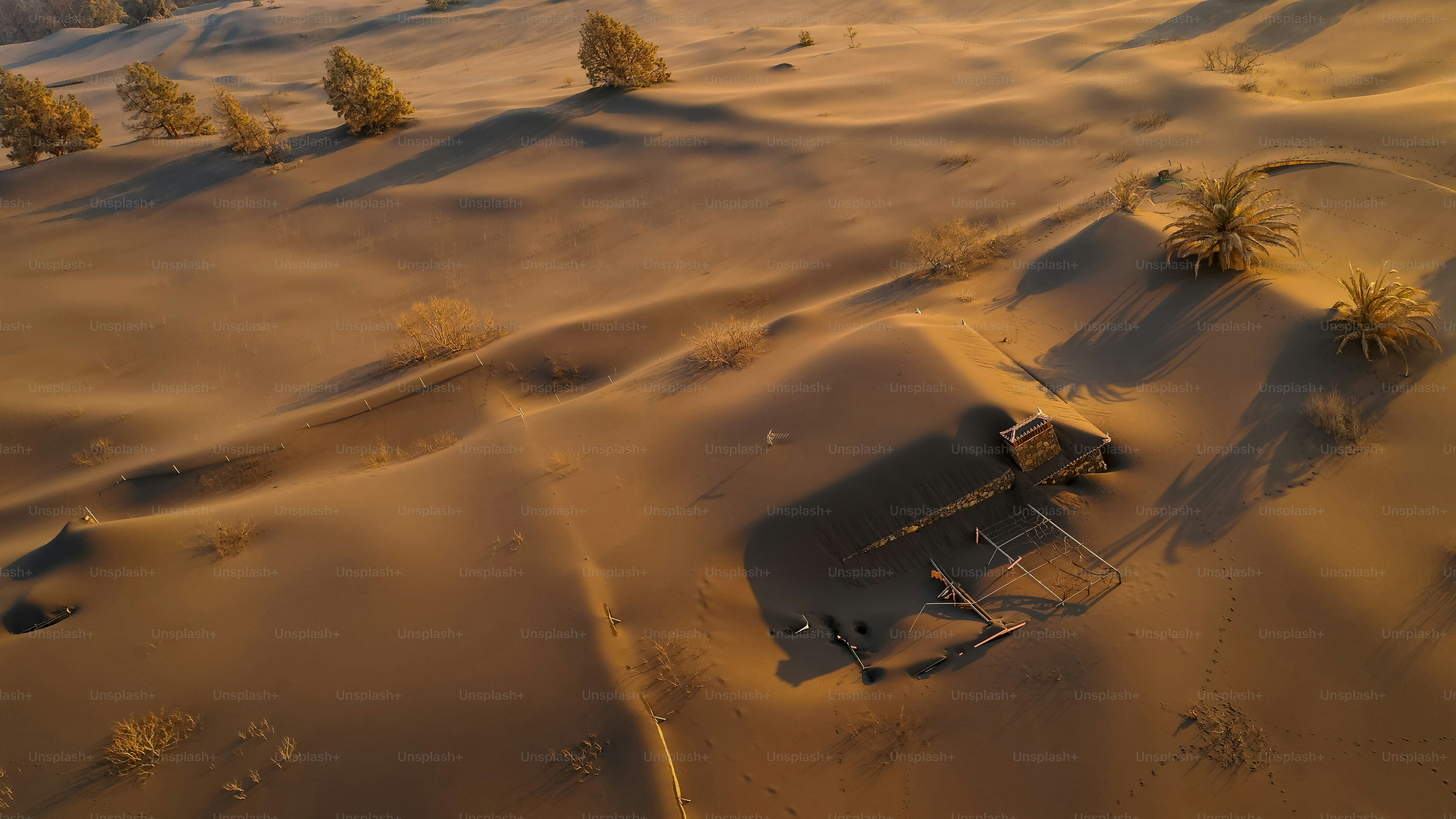 a hut in the middle of a desert