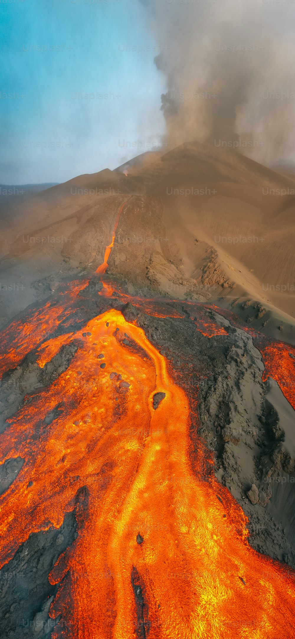 an aerial view of a lava flow in the desert