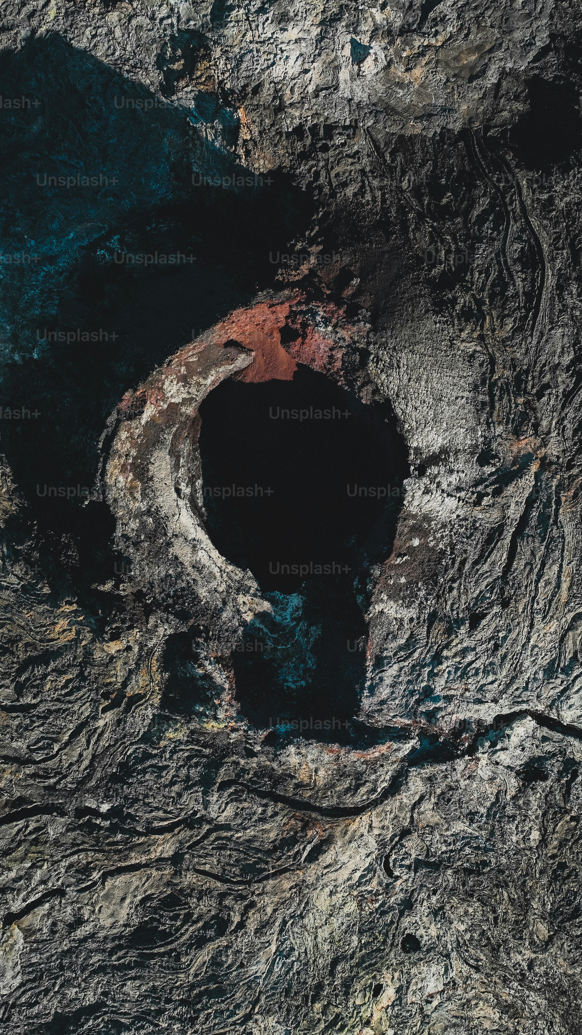 a black hole in the side of a rock