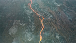 an aerial view of a river running through a valley