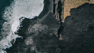 an aerial view of the ocean and land