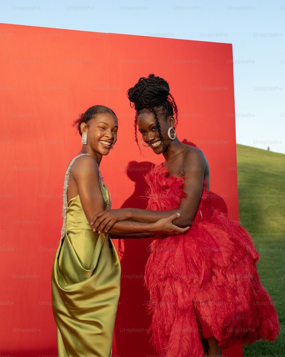 a couple of women standing next to each other