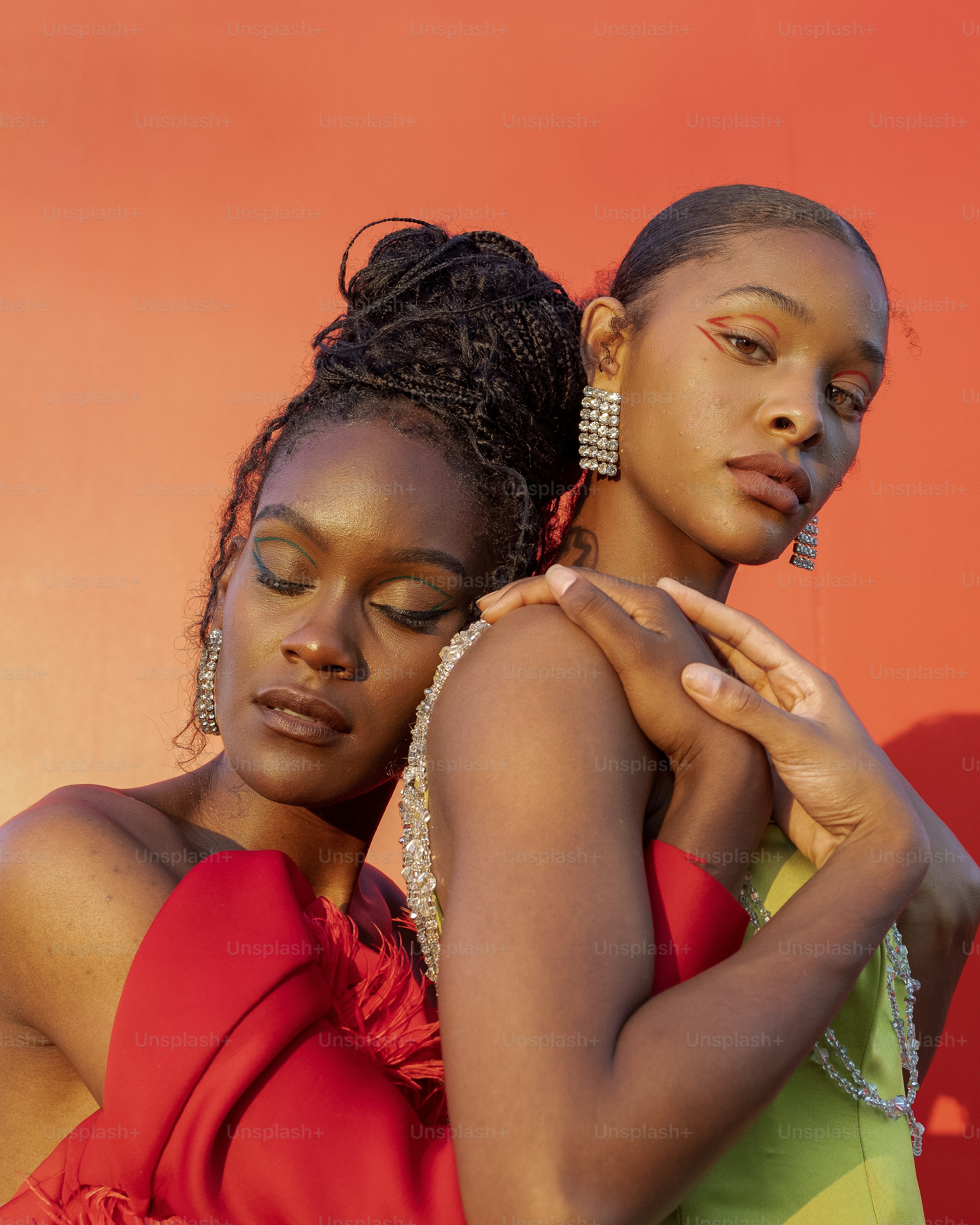 two young women are posing for a picture