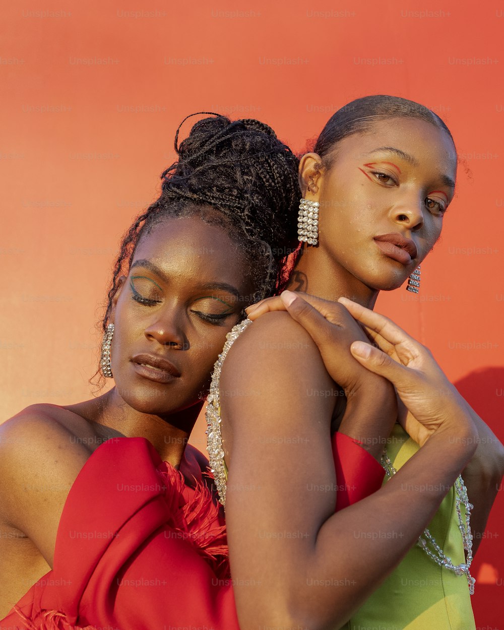 two young women are posing for a picture