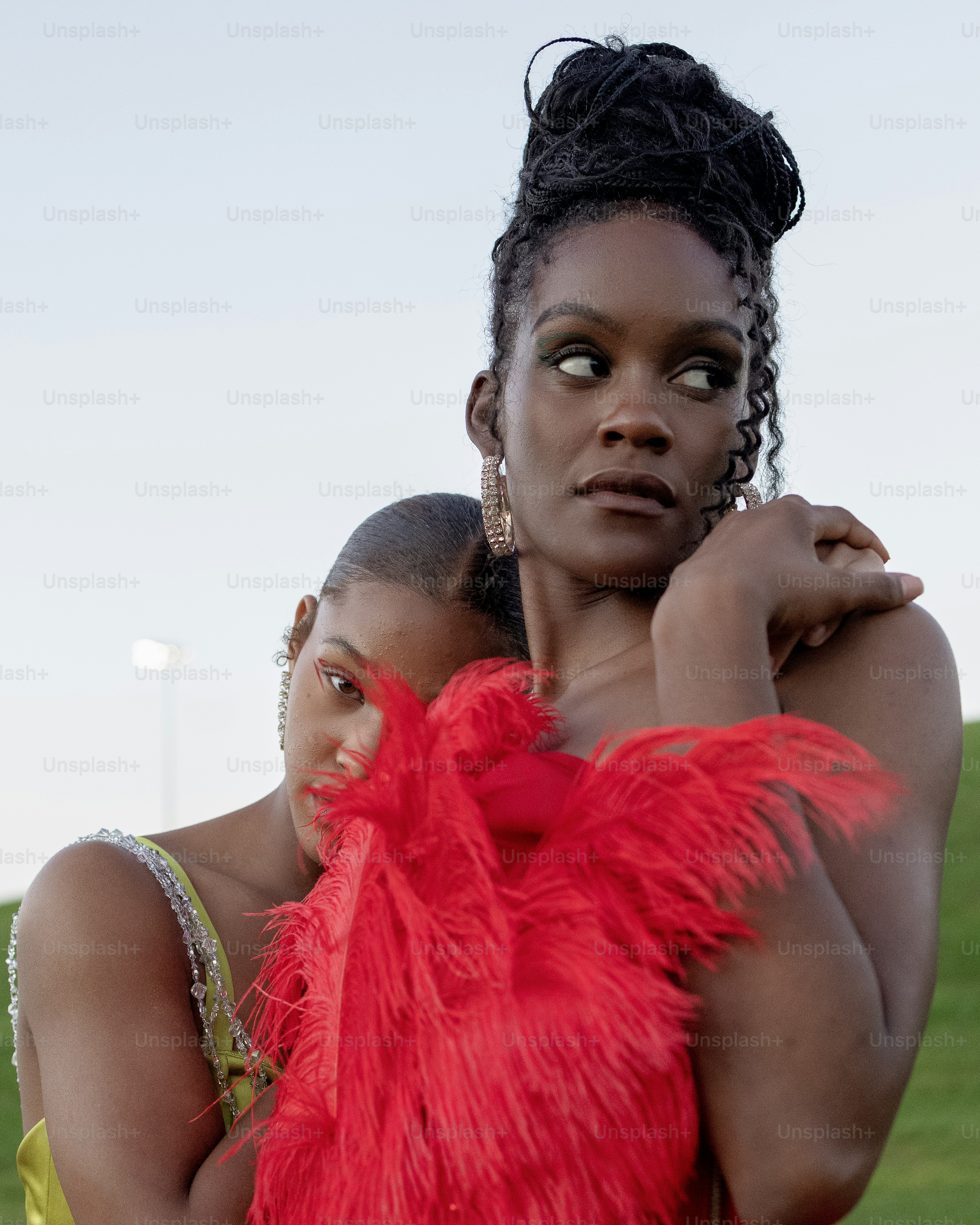 a couple of women standing next to each other