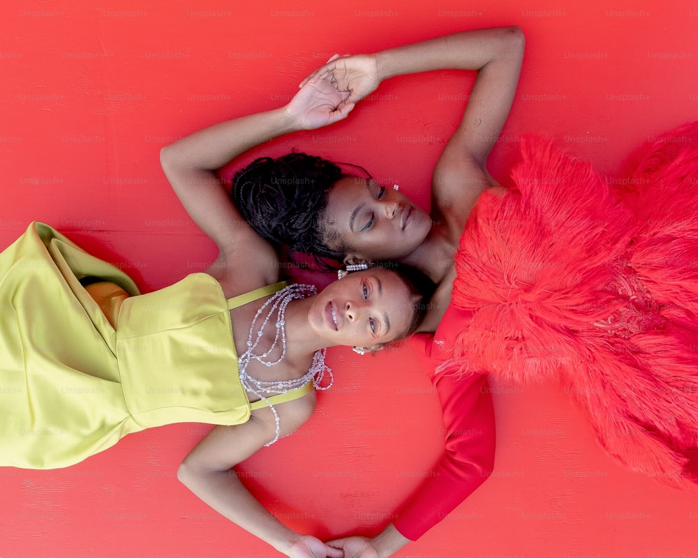 two young women are posing for a picture