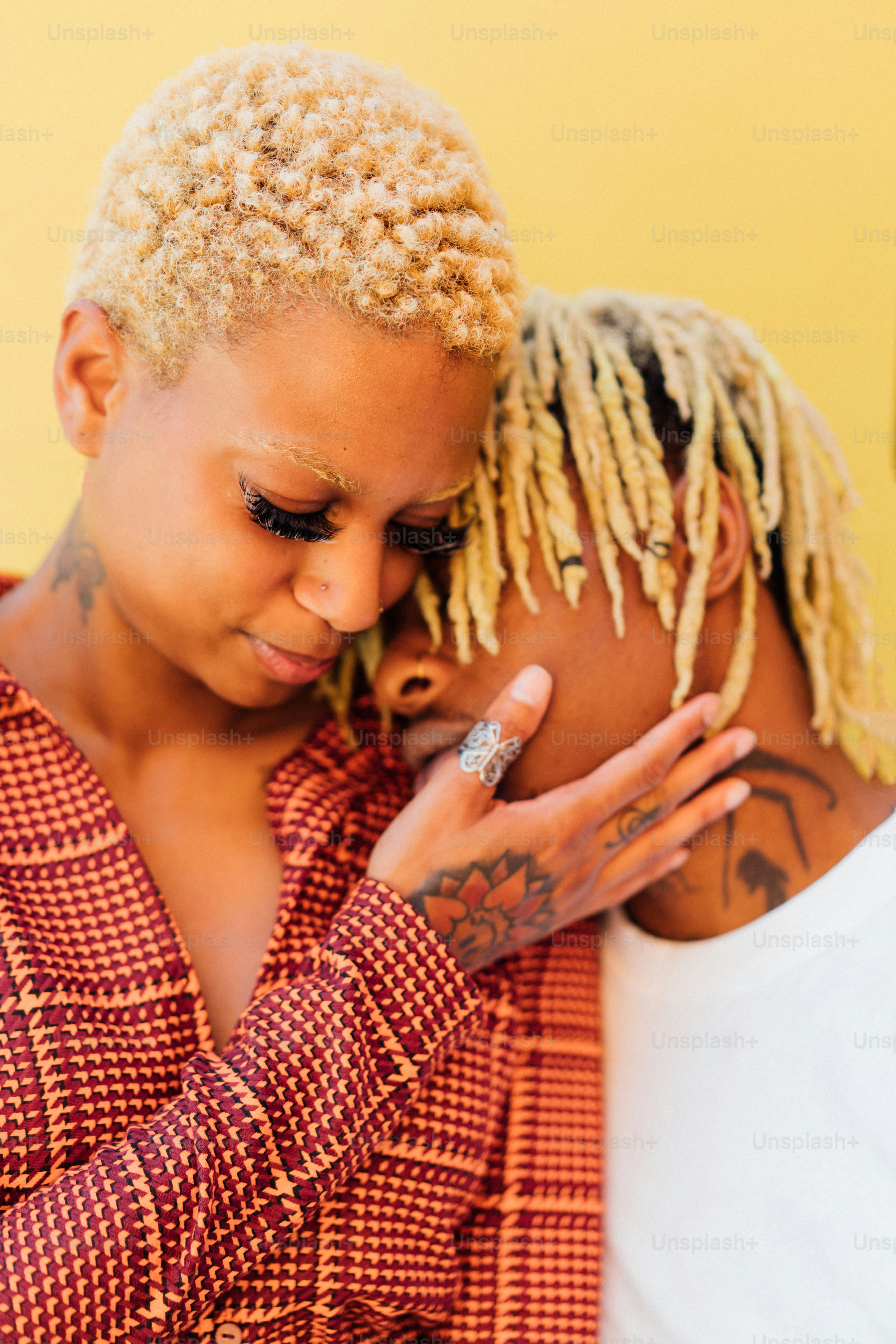 a woman with a ring on her finger and a man with a ring on his