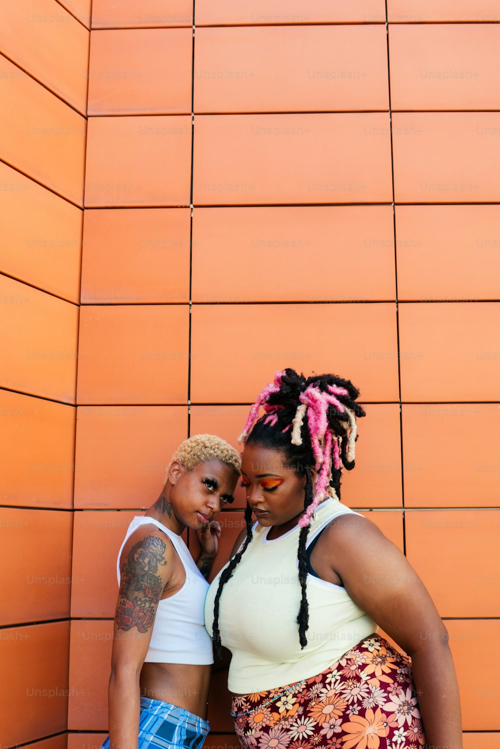 a couple of women standing next to each other