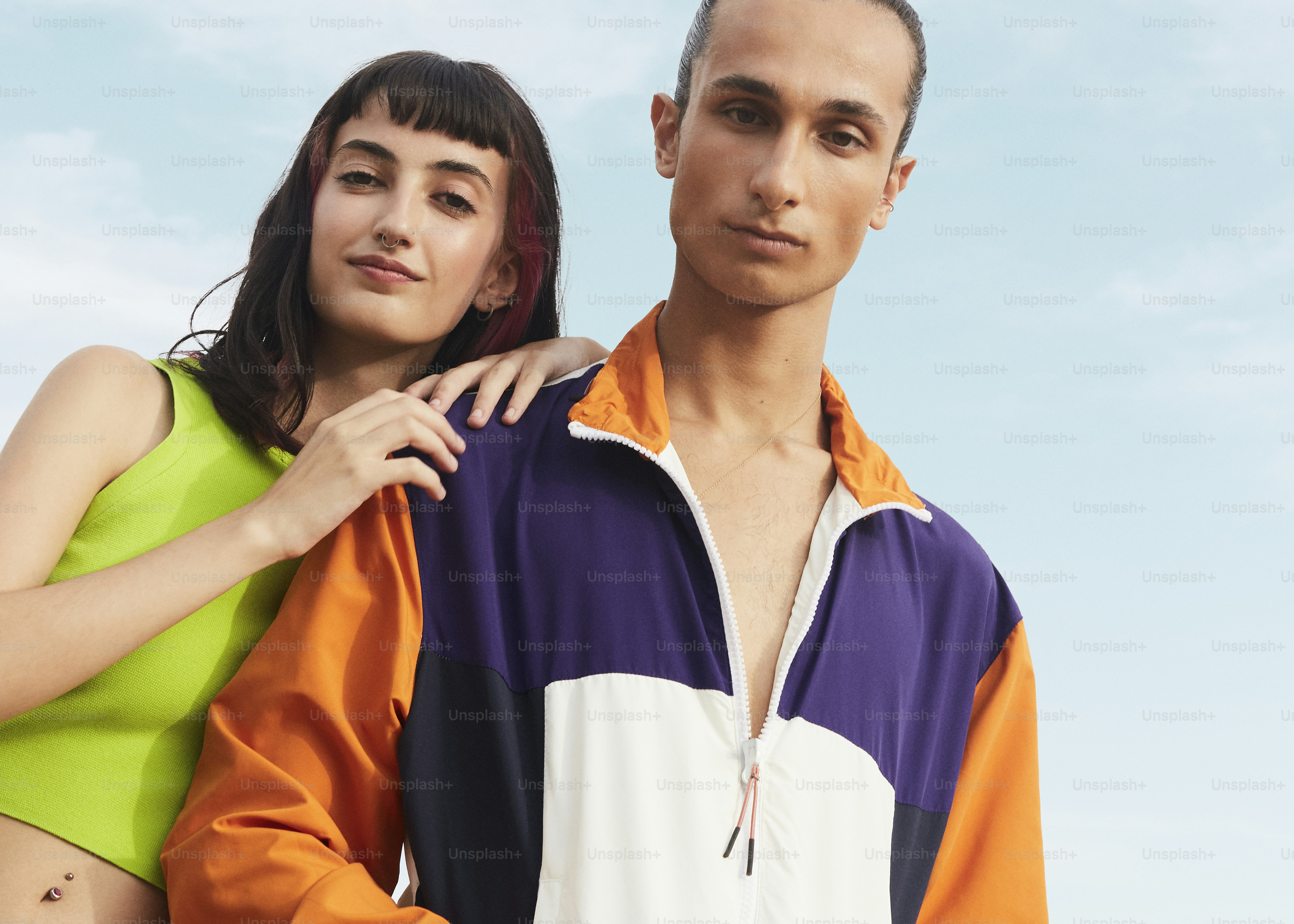 a man and a woman standing next to each other