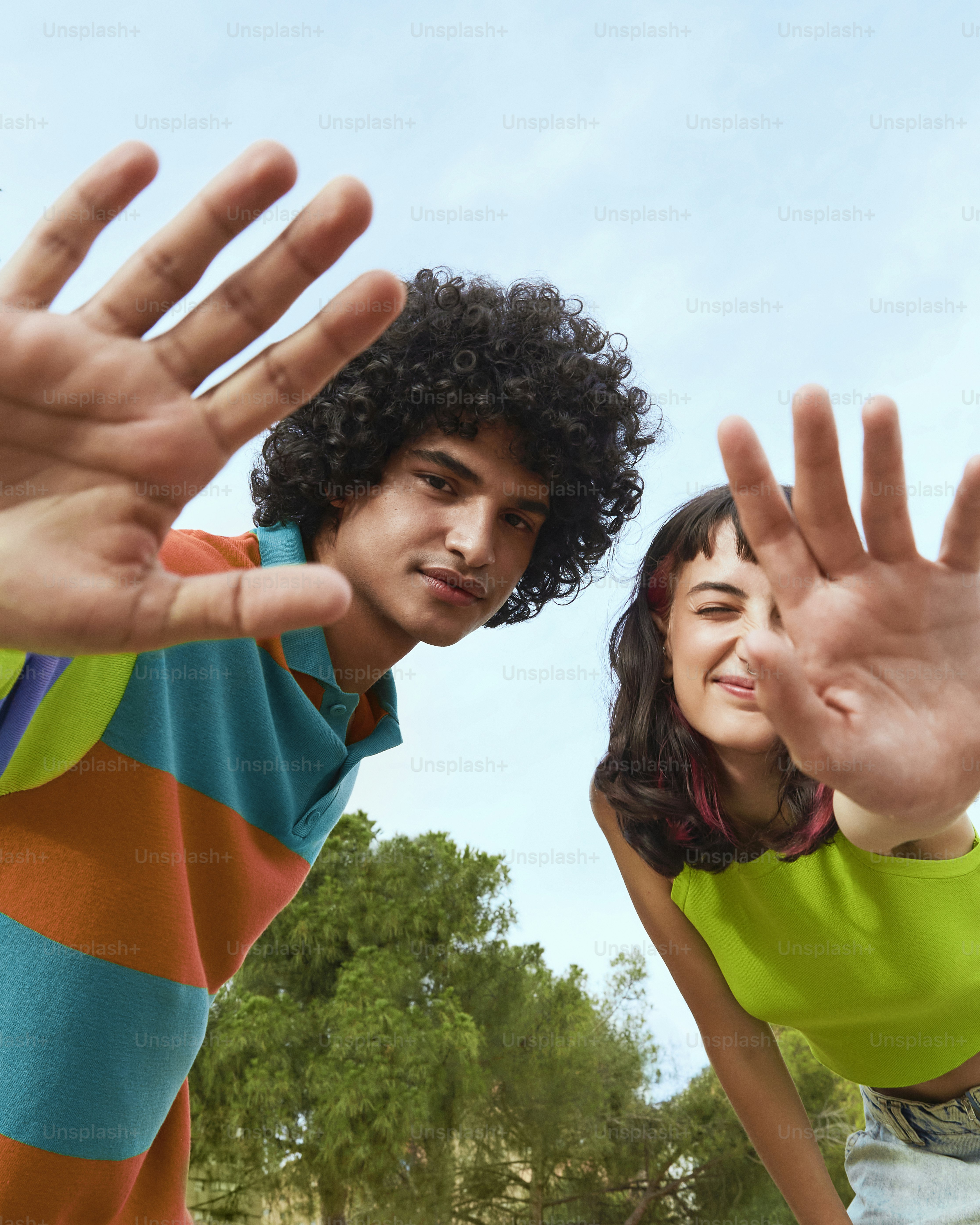 a man and a woman standing next to each other